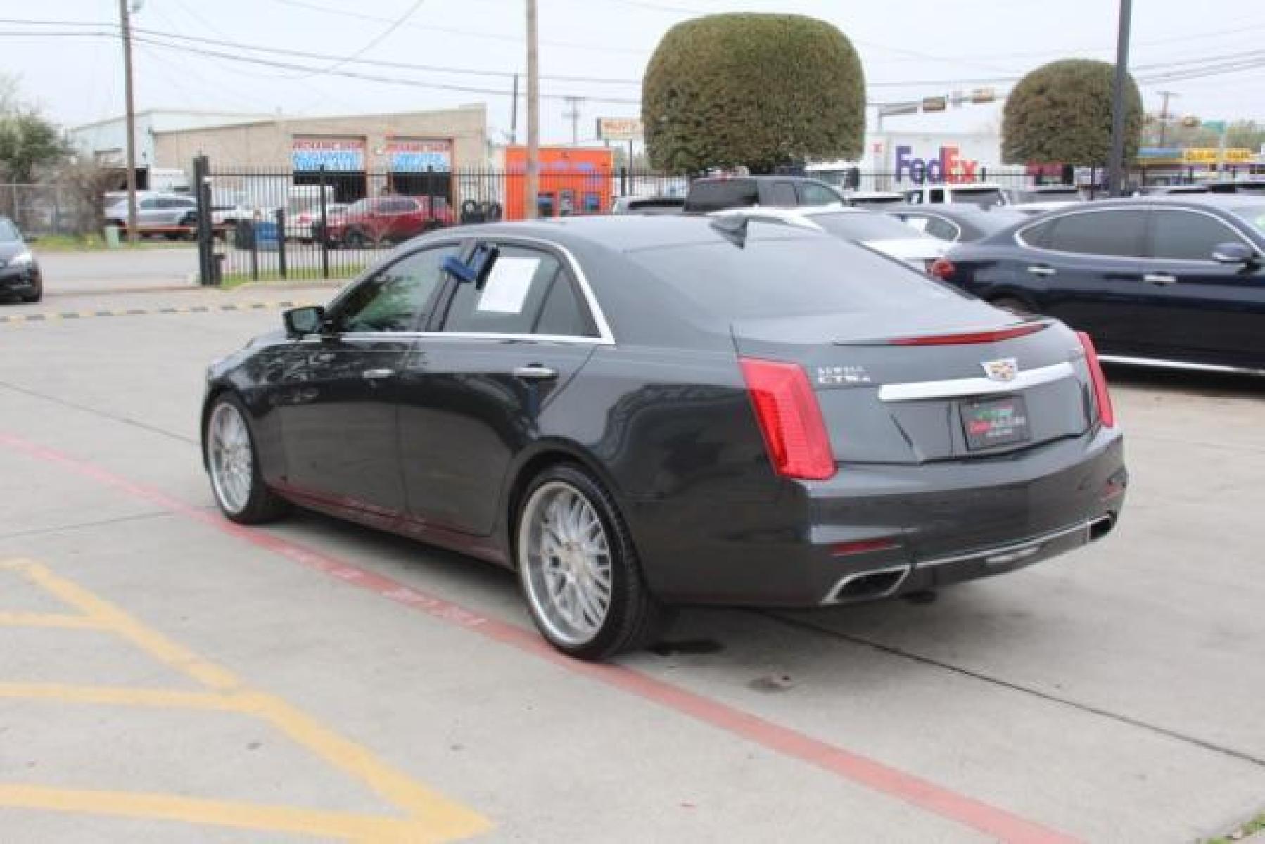 2016 Gray Cadillac CTS 2.0L Turbo Luxury AWD (1G6AX5SX5G0) with an 2.0L L4 DOHC 16V TURBO engine, 6-Speed Automatic transmission, located at 2401 E Main St., Grand Prairie, TX, 75050, (972) 262-4440, 32.749290, -96.970558 - Photo #4