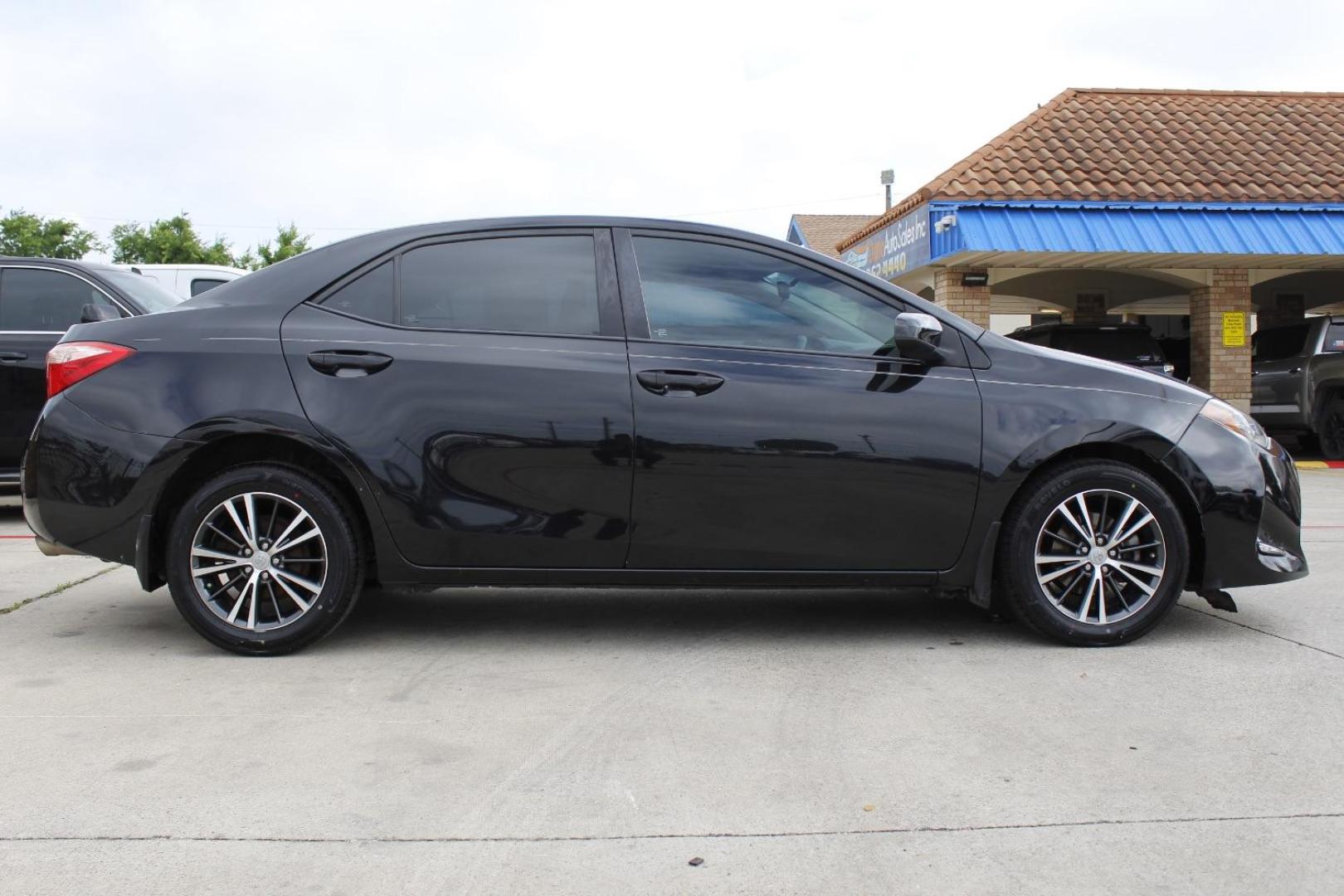 2018 Black Toyota Corolla LE CVT (5YFBURHE2JP) with an 1.8L L4 DOHC 16V engine, Continuously Variable Transmission transmission, located at 2401 E Main St., Grand Prairie, TX, 75050, (972) 262-4440, 32.748981, -96.969643 - Photo#9