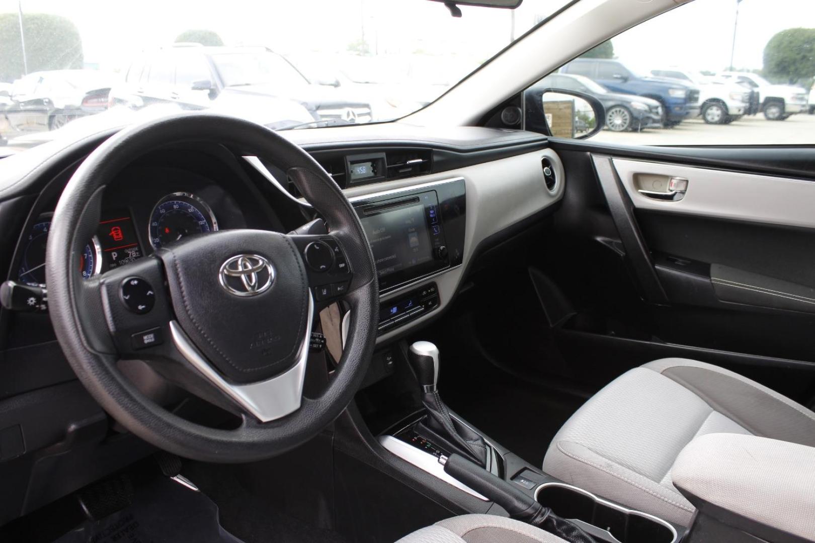 2018 Black Toyota Corolla LE CVT (5YFBURHE2JP) with an 1.8L L4 DOHC 16V engine, Continuously Variable Transmission transmission, located at 2401 E Main St., Grand Prairie, TX, 75050, (972) 262-4440, 32.748981, -96.969643 - Photo#12