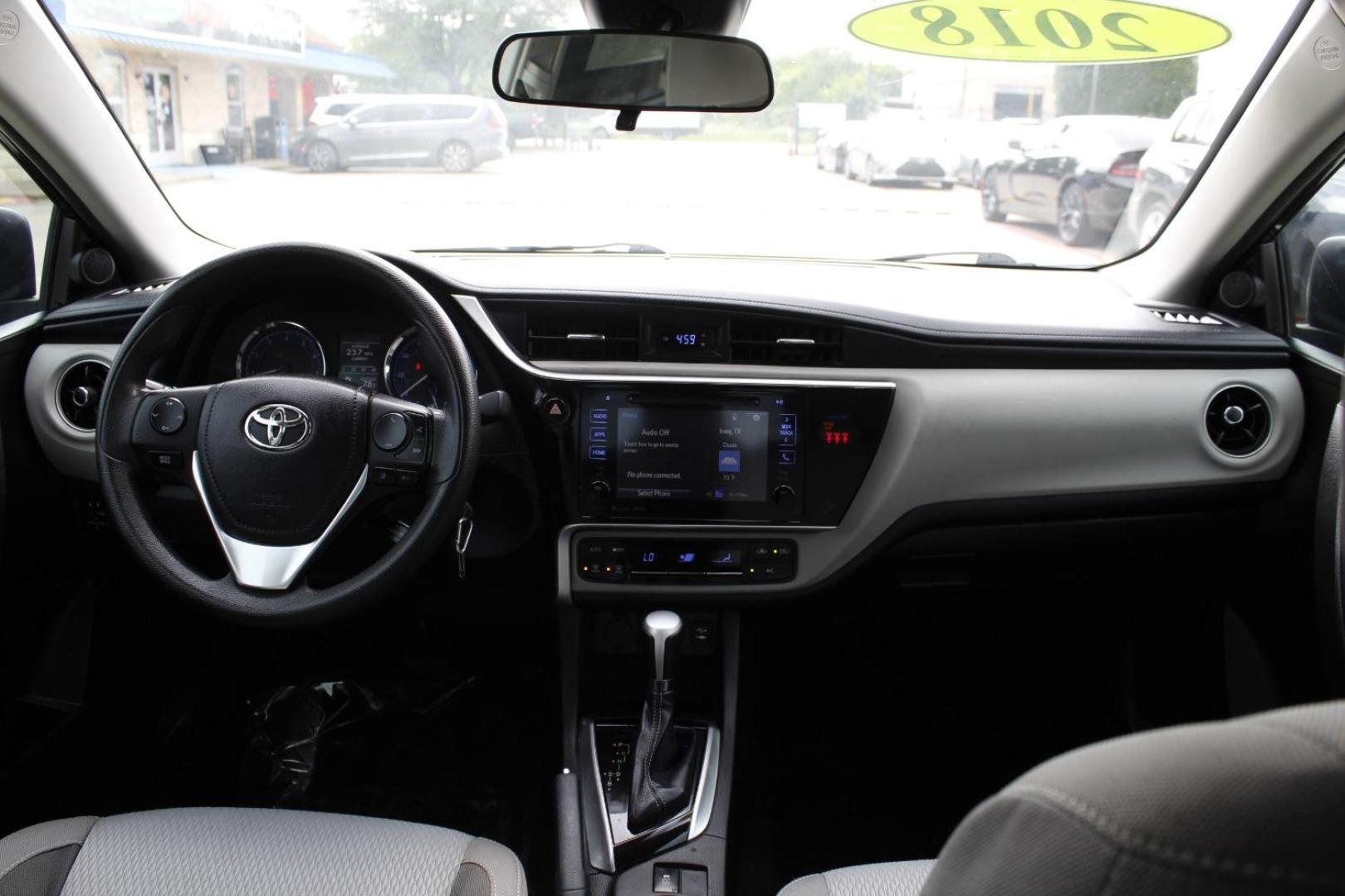 2018 Black Toyota Corolla LE CVT (5YFBURHE2JP) with an 1.8L L4 DOHC 16V engine, Continuously Variable Transmission transmission, located at 2401 E Main St., Grand Prairie, TX, 75050, (972) 262-4440, 32.748981, -96.969643 - Photo#15