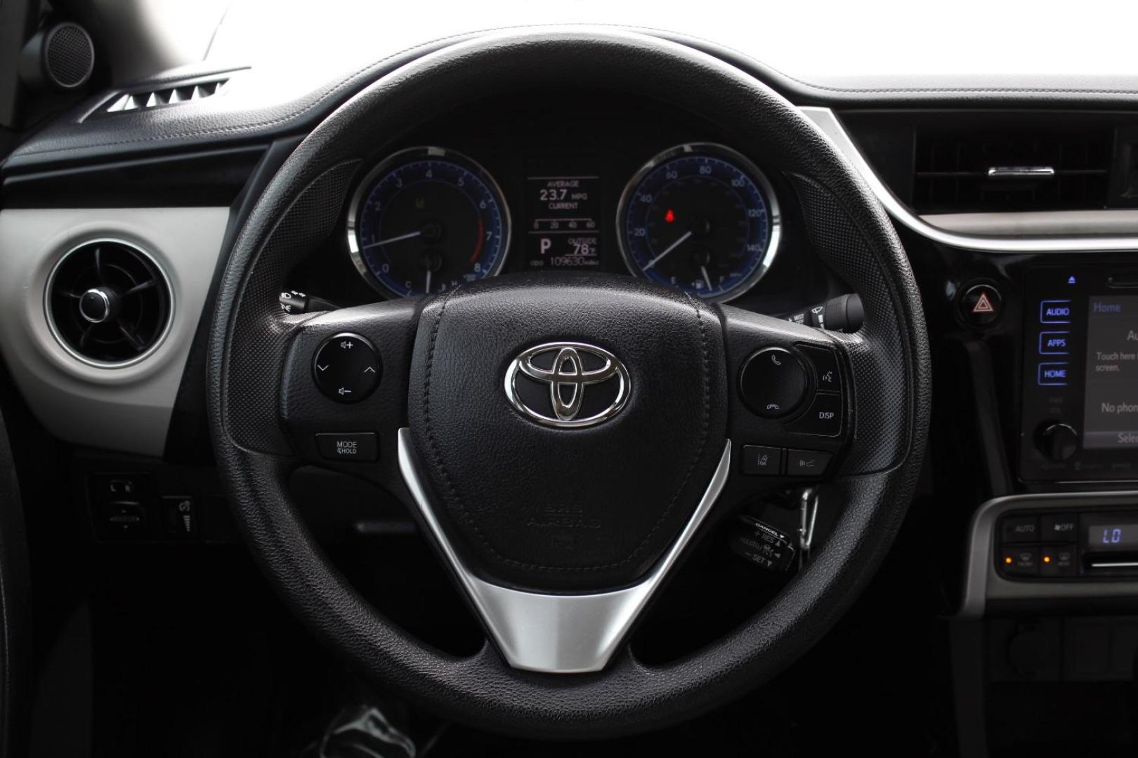 2018 Black Toyota Corolla LE CVT (5YFBURHE2JP) with an 1.8L L4 DOHC 16V engine, Continuously Variable Transmission transmission, located at 2401 E Main St., Grand Prairie, TX, 75050, (972) 262-4440, 32.748981, -96.969643 - Photo#22