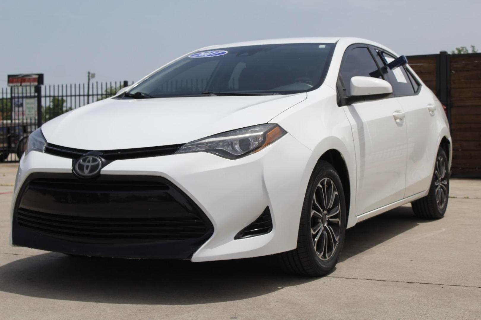 2017 WHITE Toyota Corolla LE CVT (5YFBURHE3HP) with an 1.8L L4 DOHC 16V engine, Continuously Variabl transmission, located at 2401 E Main St., Grand Prairie, TX, 75050, (972) 262-4440, 32.748981, -96.969643 - Photo#1