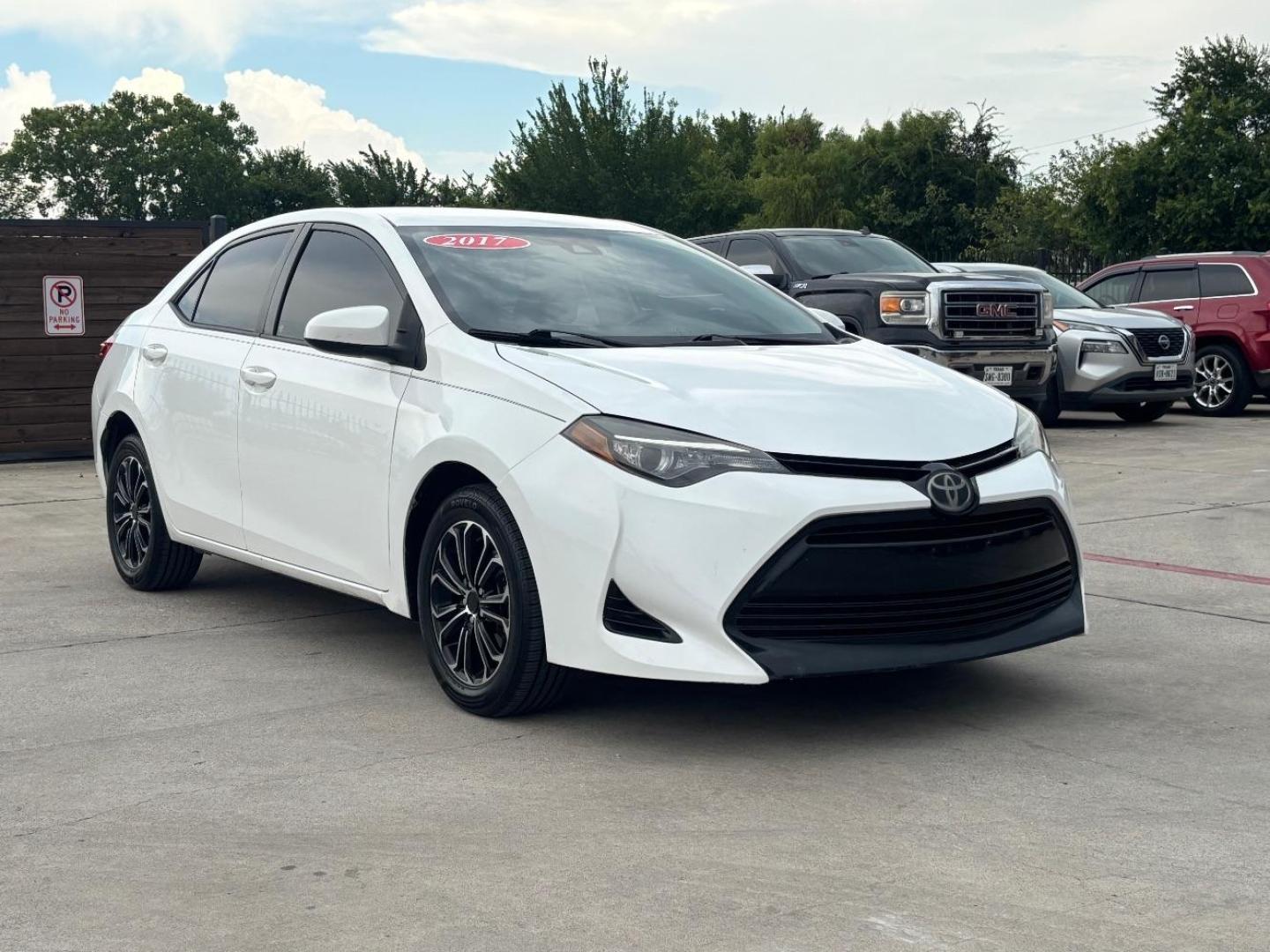2017 WHITE Toyota Corolla LE CVT (5YFBURHE3HP) with an 1.8L L4 DOHC 16V engine, Continuously Variabl transmission, located at 2401 E Main St., Grand Prairie, TX, 75050, (972) 262-4440, 32.748981, -96.969643 - Photo#1
