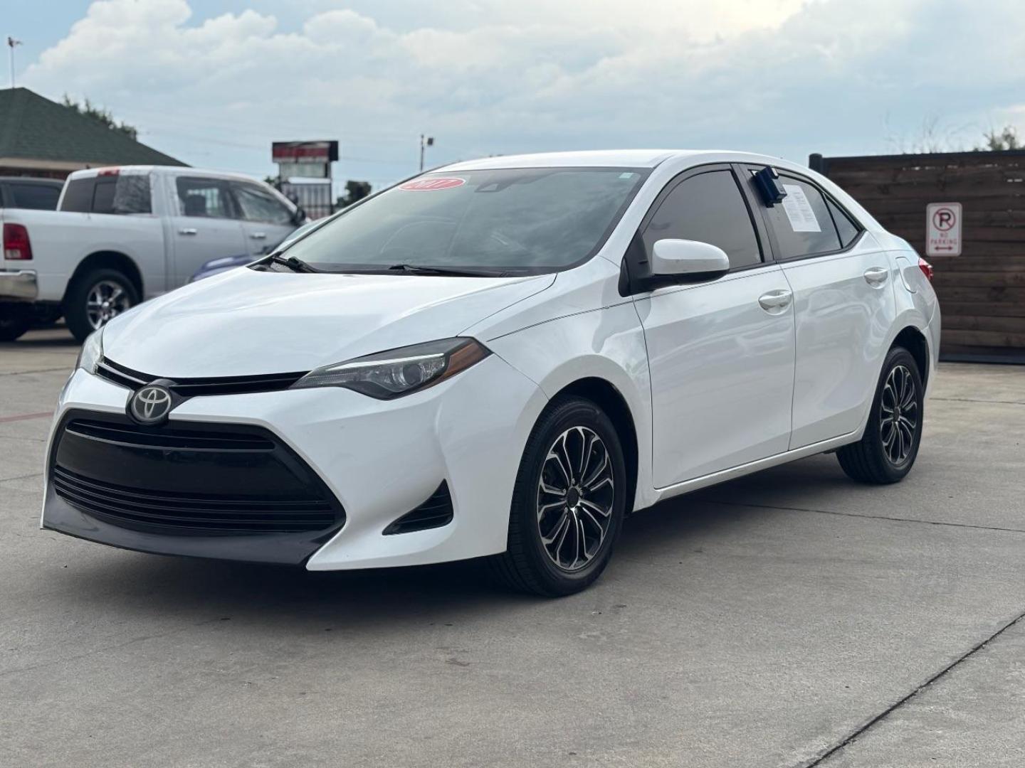 2017 WHITE Toyota Corolla LE CVT (5YFBURHE3HP) with an 1.8L L4 DOHC 16V engine, Continuously Variabl transmission, located at 2401 E Main St., Grand Prairie, TX, 75050, (972) 262-4440, 32.748981, -96.969643 - Photo#2