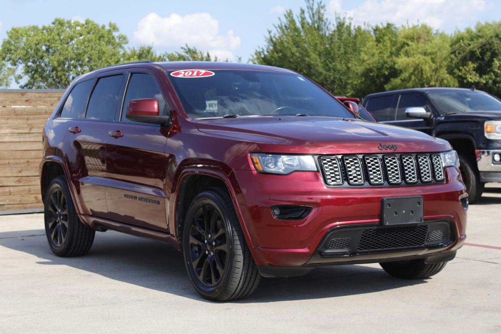 2017 RED Jeep Grand Cherokee Laredo 4WD (1C4RJFAG9HC) with an 3.6L V6 DOHC 24V engine, 8-Speed Automatic transmission, located at 2401 E Main St., Grand Prairie, TX, 75050, (972) 262-4440, 32.748981, -96.969643 - Photo#1