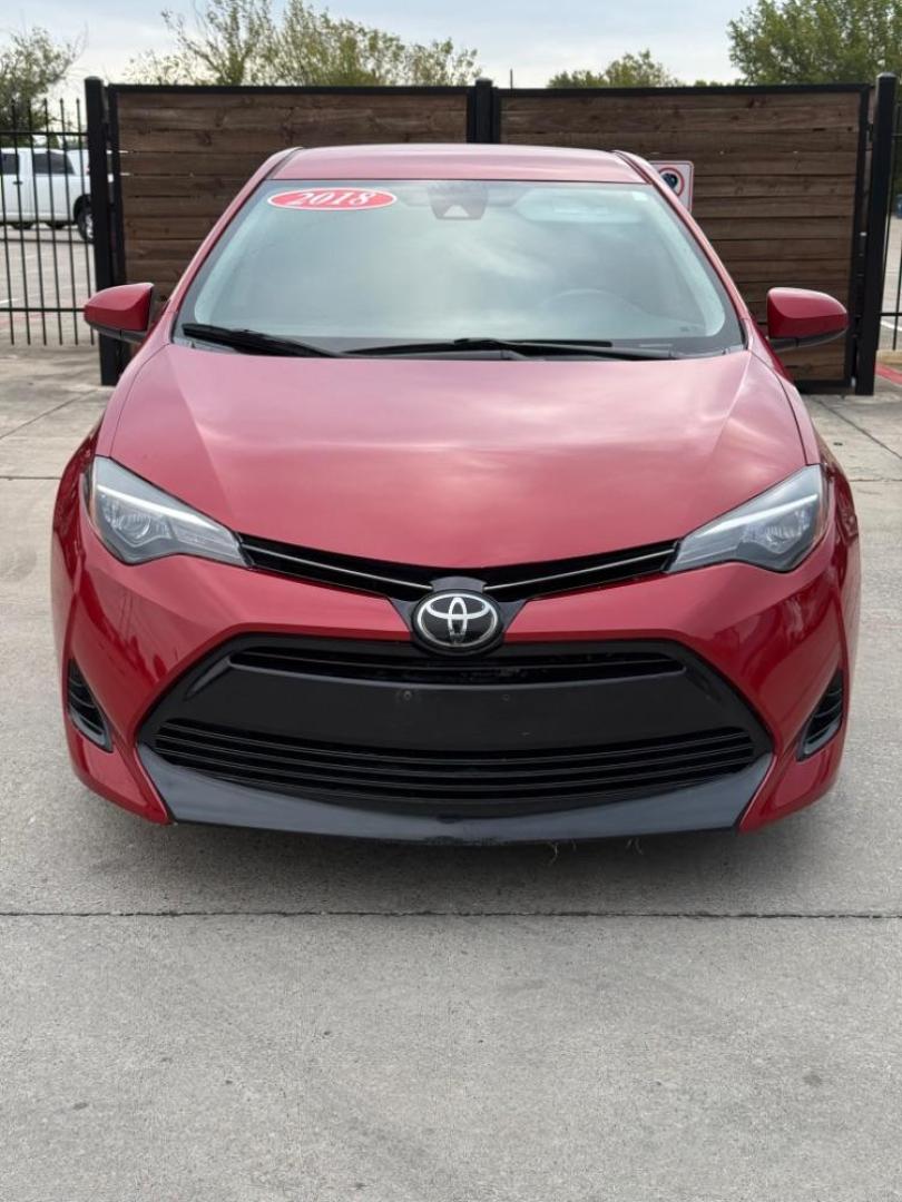 2018 red Toyota Corolla LE CVT (5YFBURHE8JP) with an 1.8L L4 DOHC 16V engine, Continuously Variabl transmission, located at 2401 E Main St., Grand Prairie, TX, 75050, (972) 262-4440, 32.748981, -96.969643 - Photo#1