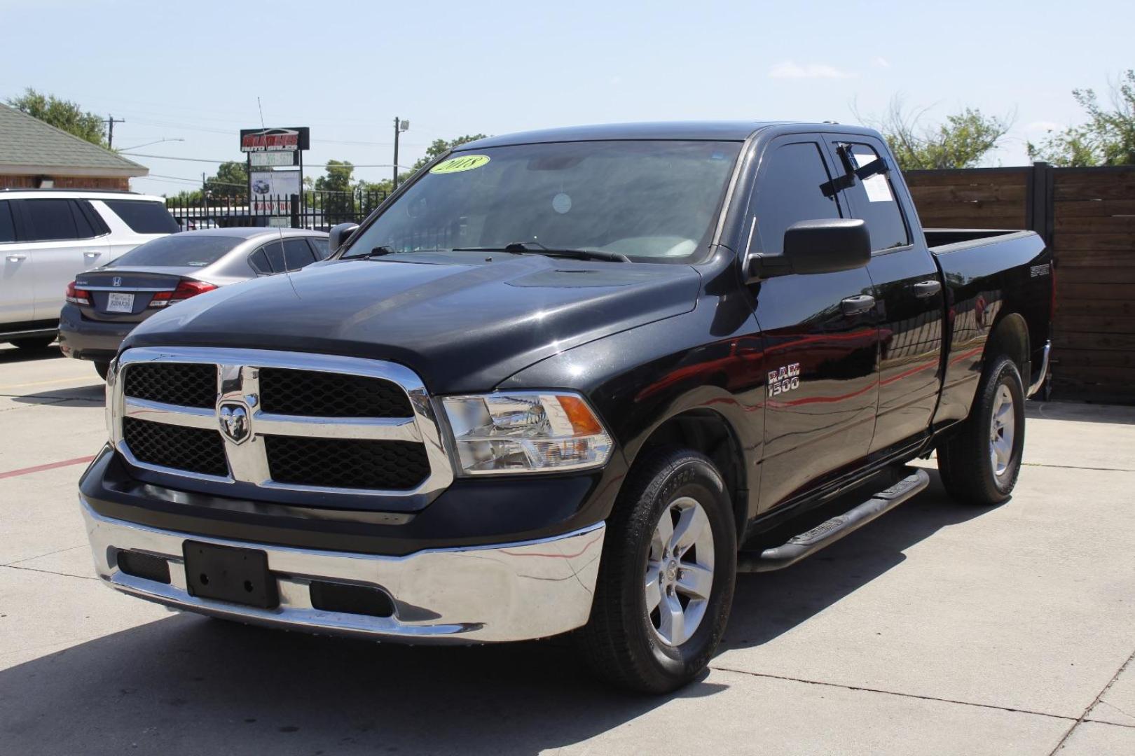 2018 black RAM 1500 Tradesman Quad Cab 2 (1C6RR6FG7JS) with an 3.6L V6 DOHC 24V FFV engine, 8-Speed Automatic transmission, located at 2401 E Main St., Grand Prairie, TX, 75050, (972) 262-4440, 32.748981, -96.969643 - Photo#1