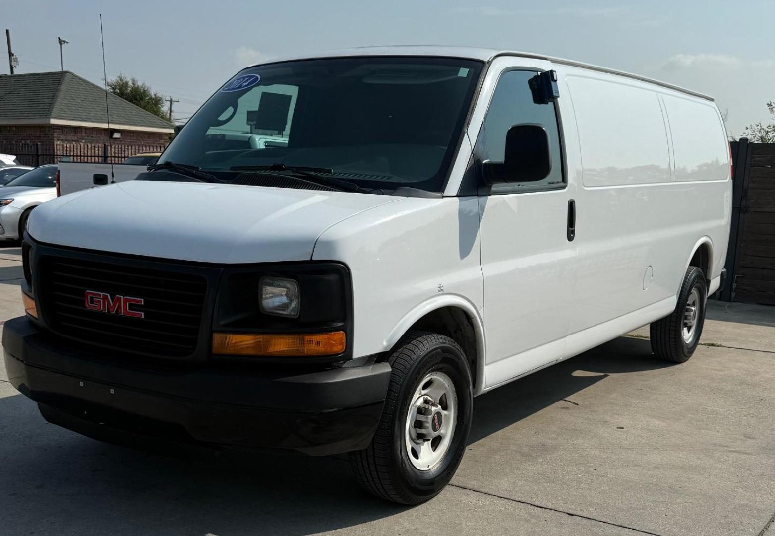 2014 WHITE GMC Savana G2500 Extended Cargo (1GTW7GCA7E1) with an 4.8L V8 OHV 16V FFV engine, 6-Speed Automatic transmission, located at 2401 E Main St., Grand Prairie, TX, 75050, (972) 262-4440, 32.748981, -96.969643 - Photo#2