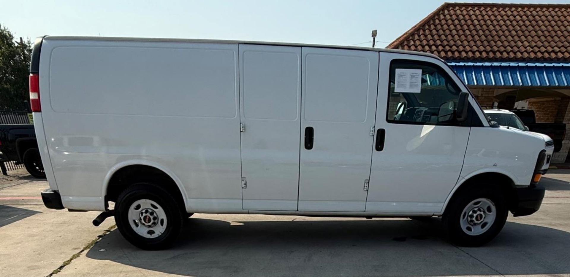 2014 WHITE GMC Savana G2500 Extended Cargo (1GTW7GCA7E1) with an 4.8L V8 OHV 16V FFV engine, 6-Speed Automatic transmission, located at 2401 E Main St., Grand Prairie, TX, 75050, (972) 262-4440, 32.748981, -96.969643 - Photo#11