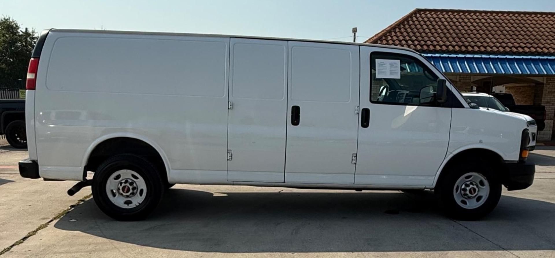 2014 WHITE GMC Savana G2500 Extended Cargo (1GTW7GCA7E1) with an 4.8L V8 OHV 16V FFV engine, 6-Speed Automatic transmission, located at 2401 E Main St., Grand Prairie, TX, 75050, (972) 262-4440, 32.748981, -96.969643 - Photo#12