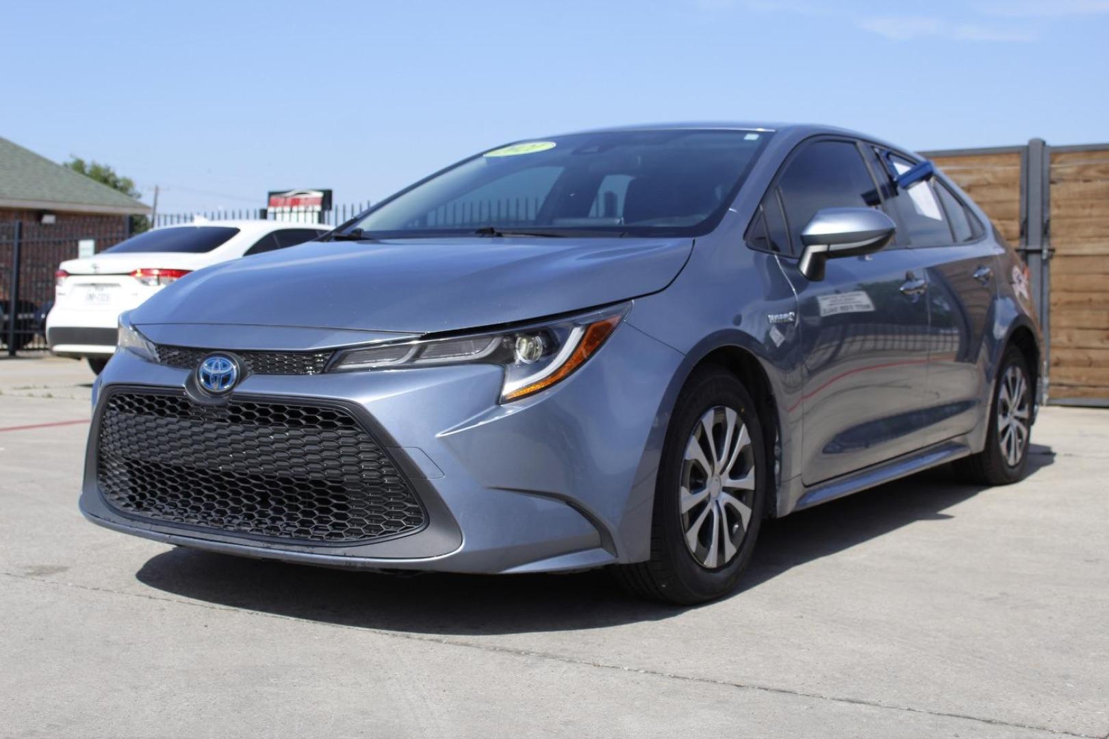 2021 Gray Toyota Corolla Hybrid LE (JTDEAMDE4MJ) with an 1.8L I-4 DOHC engine, located at 2401 E Main St., Grand Prairie, TX, 75050, (972) 262-4440, 32.748981, -96.969643 - Photo#1