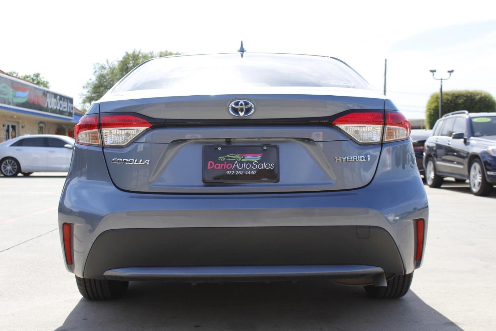 2021 Gray Toyota Corolla Hybrid LE (JTDEAMDE4MJ) with an 1.8L I-4 DOHC engine, located at 2401 E Main St., Grand Prairie, TX, 75050, (972) 262-4440, 32.748981, -96.969643 - Photo#5