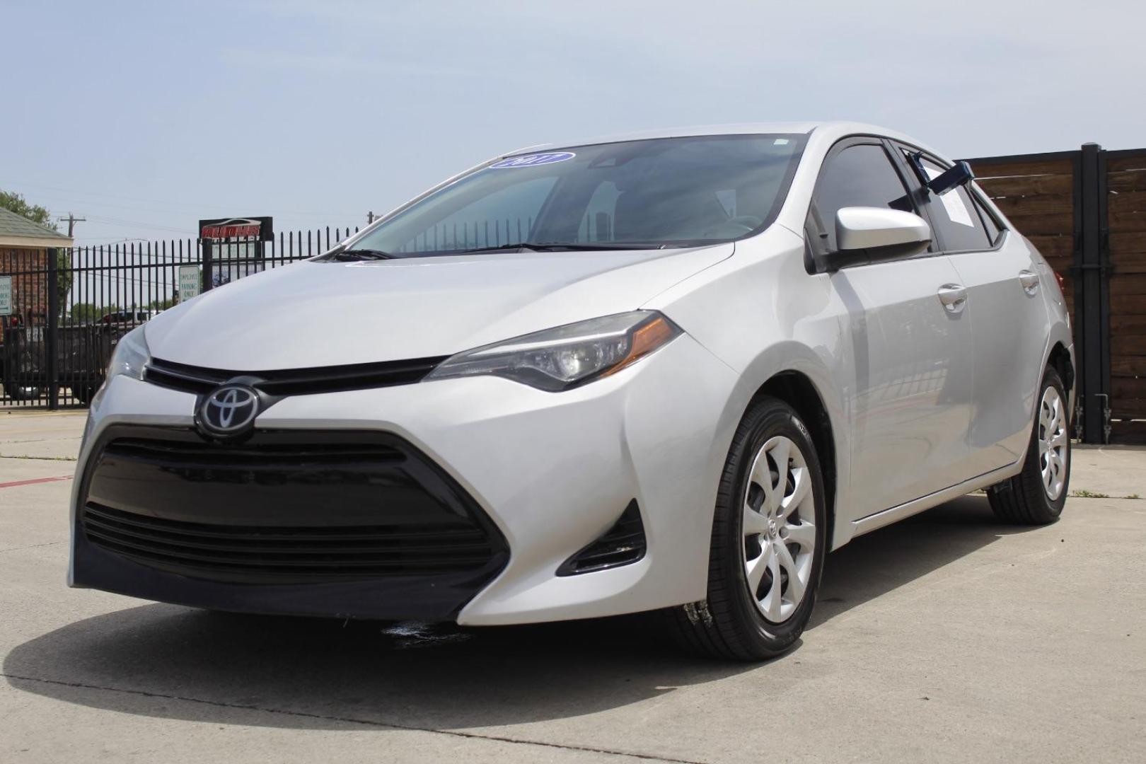 2017 Silver Toyota Corolla LE (5YFBURHE7HP) with an 1.8L I-4 DOHC engine, located at 2401 E Main St., Grand Prairie, TX, 75050, (972) 262-4440, 32.748981, -96.969643 - Photo#1
