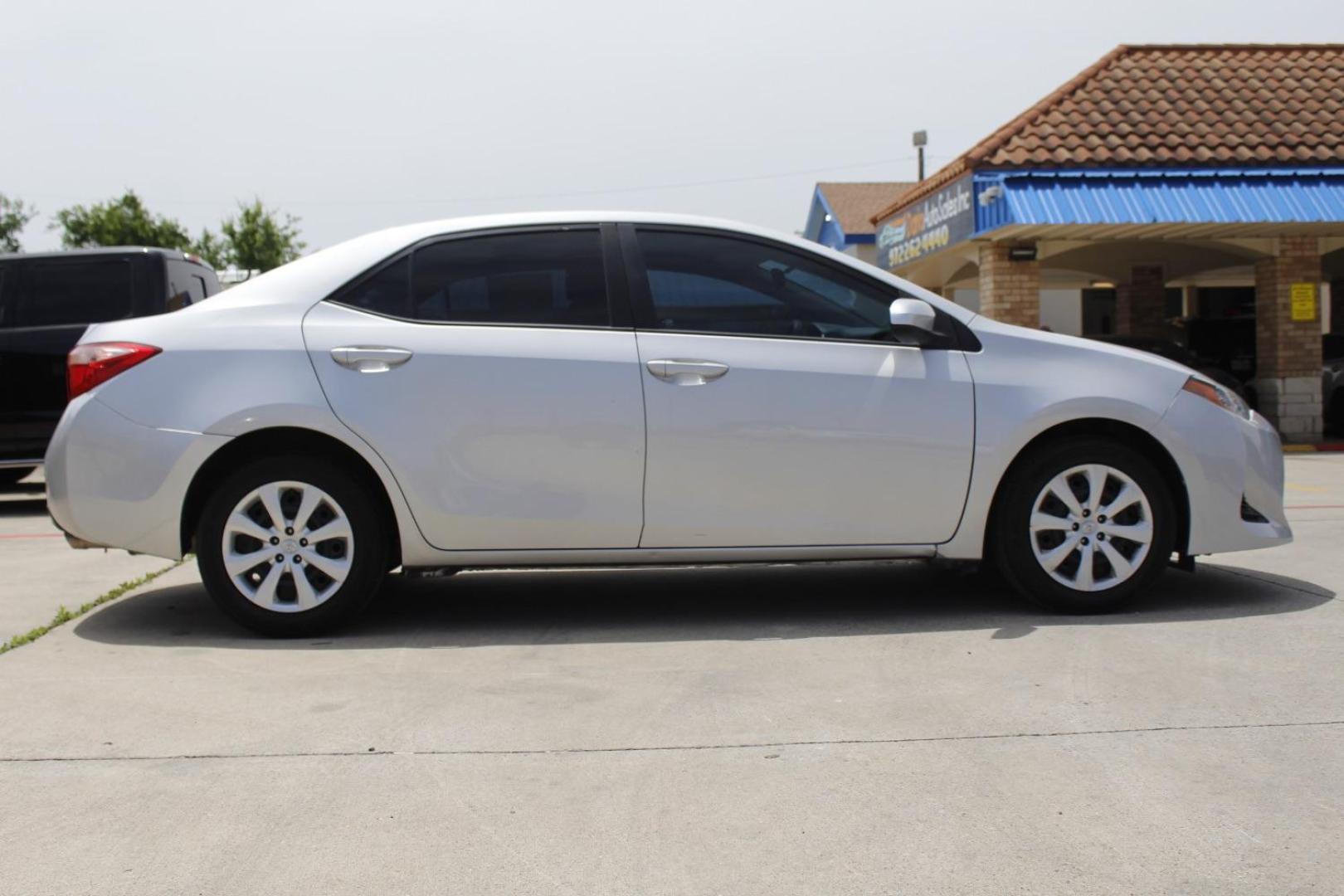 2017 Silver Toyota Corolla LE (5YFBURHE7HP) with an 1.8L I-4 DOHC engine, located at 2401 E Main St., Grand Prairie, TX, 75050, (972) 262-4440, 32.748981, -96.969643 - Photo#9