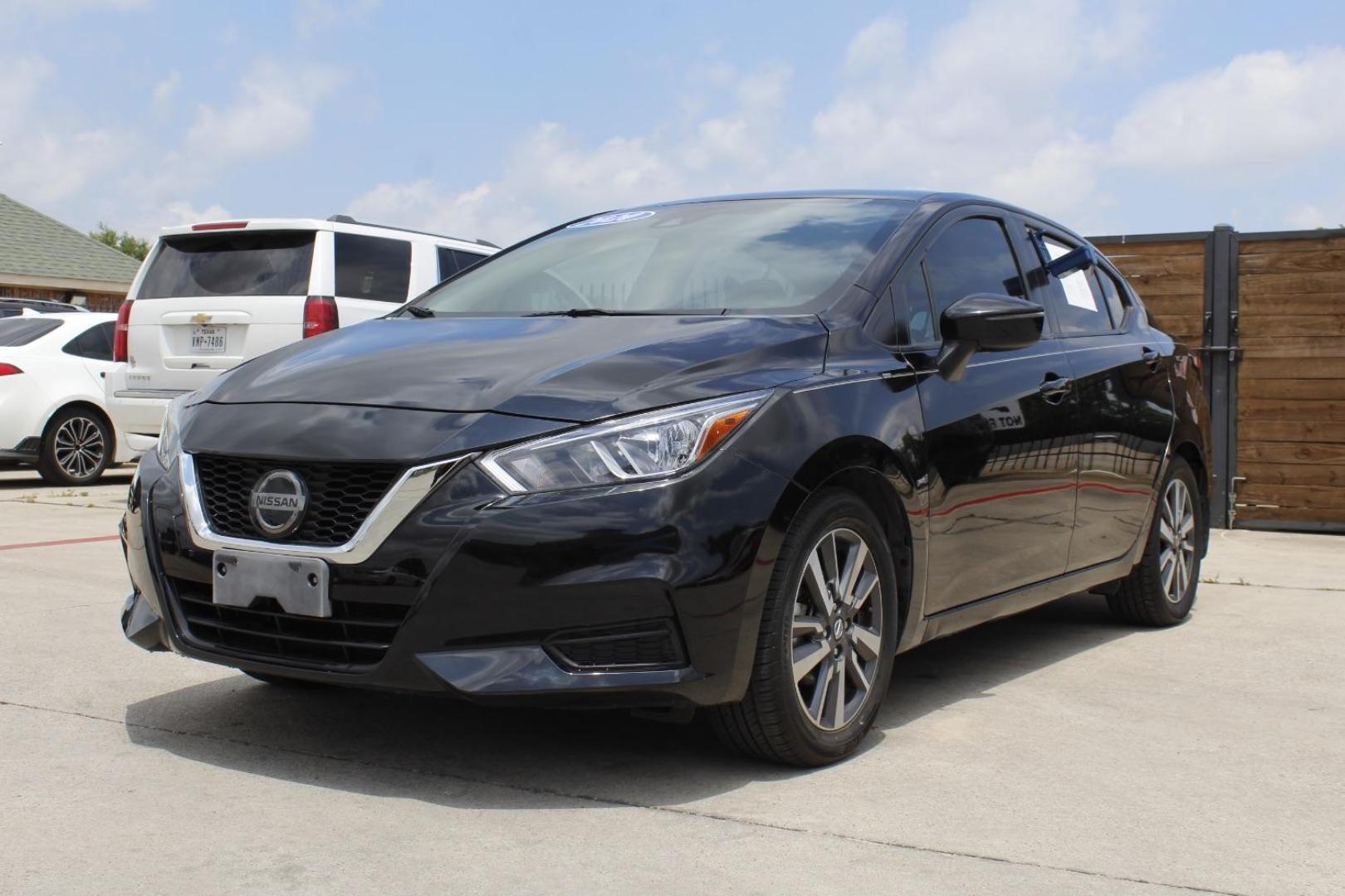 2020 Black Nissan Versa SV Xtronic CVT (3N1CN8EV3LL) with an 1.6L I-4 DOHC engine, located at 2401 E Main St., Grand Prairie, TX, 75050, (972) 262-4440, 32.748981, -96.969643 - Photo#1