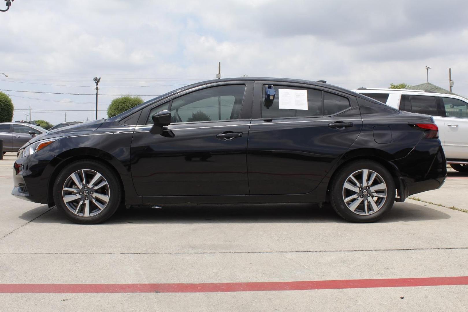2020 Black Nissan Versa SV Xtronic CVT (3N1CN8EV3LL) with an 1.6L I-4 DOHC engine, located at 2401 E Main St., Grand Prairie, TX, 75050, (972) 262-4440, 32.748981, -96.969643 - Photo#2