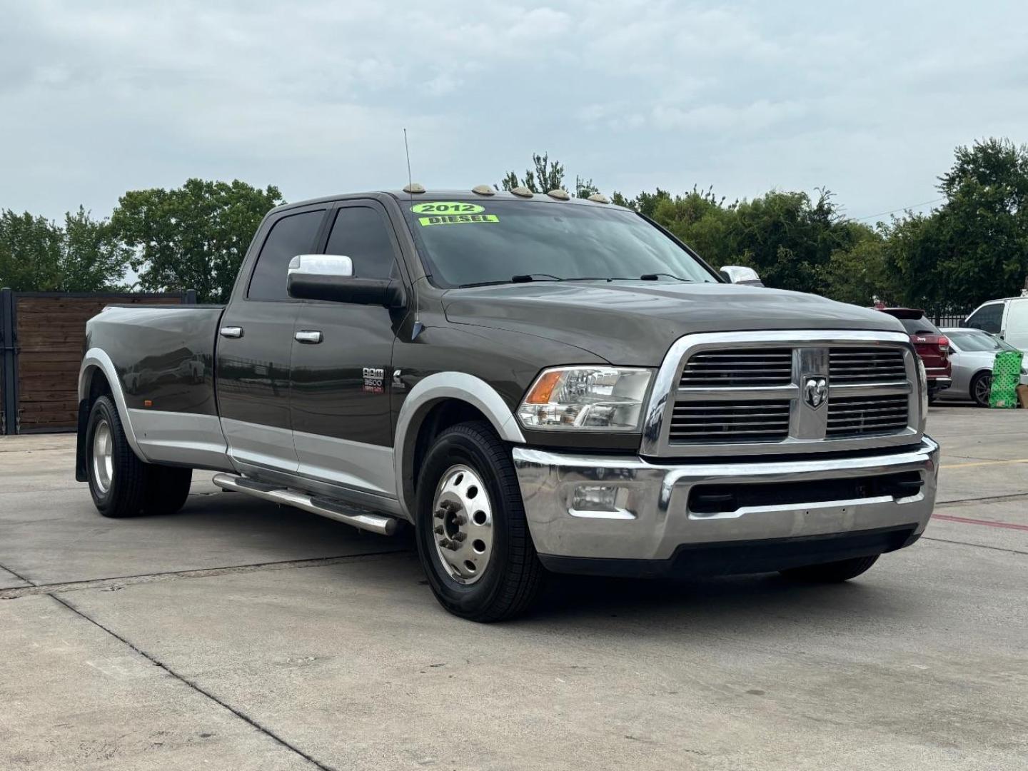 2012 Green Ram 3500 Laramie (3C63DPJLXCG) with an Cummins 6.7L I-6 diesel direct injection engine, located at 2401 E Main St., Grand Prairie, TX, 75050, (972) 262-4440, 32.748981, -96.969643 - Photo#1