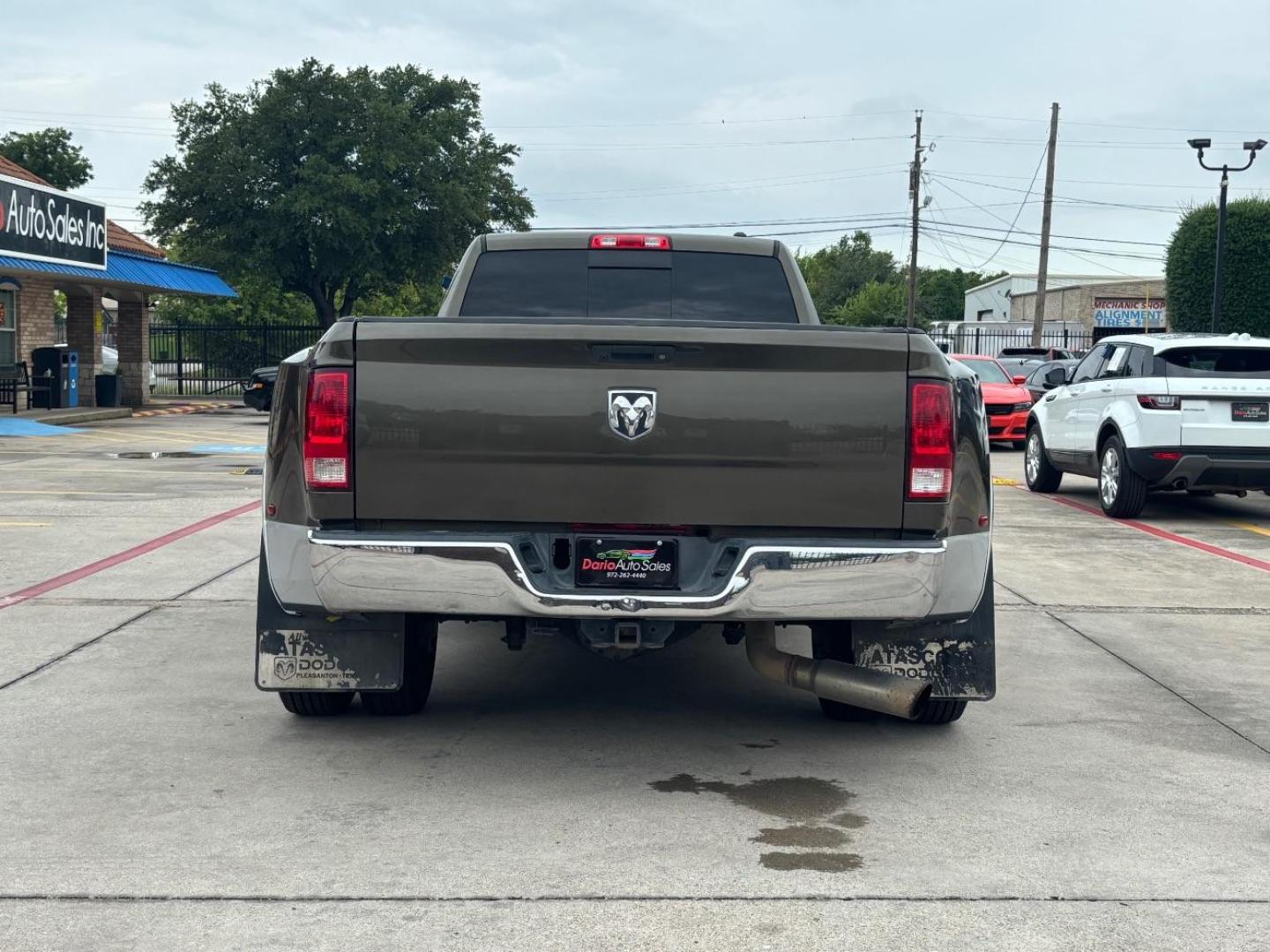 2012 Green Ram 3500 Laramie (3C63DPJLXCG) with an Cummins 6.7L I-6 diesel direct injection engine, located at 2401 E Main St., Grand Prairie, TX, 75050, (972) 262-4440, 32.748981, -96.969643 - Photo#7