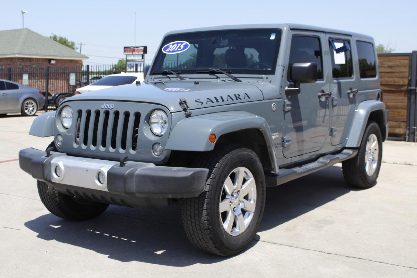 2015 Gray Jeep Wrangler Unlimited Sahara 4WD (1C4BJWEGXFL) with an 3.6L V6 DOHC 24V FFV engine, located at 2401 E Main St., Grand Prairie, TX, 75050, (972) 262-4440, 32.748981, -96.969643 - Photo#1