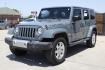 2015 Gray Jeep Wrangler Unlimited Sahara 4WD (1C4BJWEGXFL) with an 3.6L V6 DOHC 24V FFV engine, located at 2401 E Main St., Grand Prairie, TX, 75050, (972) 262-4440, 32.748981, -96.969643 - Photo#1
