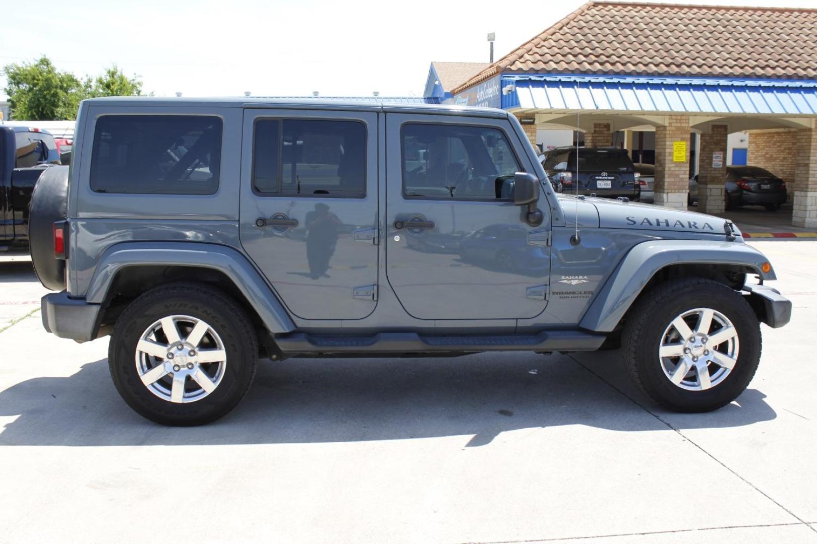 2015 Gray Jeep Wrangler Unlimited Sahara 4WD (1C4BJWEGXFL) with an 3.6L V6 DOHC 24V FFV engine, located at 2401 E Main St., Grand Prairie, TX, 75050, (972) 262-4440, 32.748981, -96.969643 - Photo#7