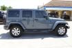 2015 Gray Jeep Wrangler Unlimited Sahara 4WD (1C4BJWEGXFL) with an 3.6L V6 DOHC 24V FFV engine, located at 2401 E Main St., Grand Prairie, TX, 75050, (972) 262-4440, 32.748981, -96.969643 - Photo#7