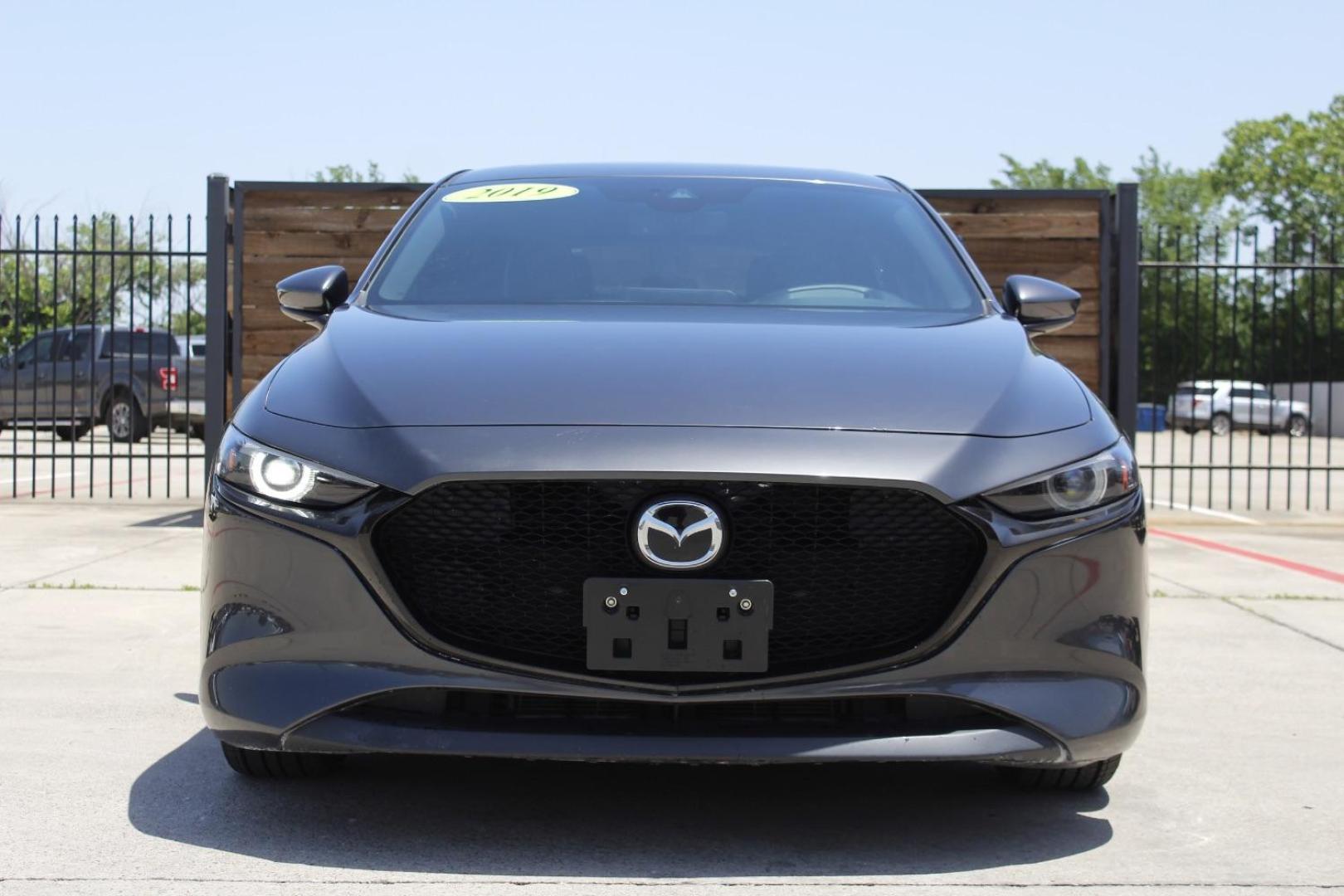2019 Gray Mazda Mazda3 Hatchback Premium Package (JM1BPANM1K1) with an SKYACTIV-G 2.5L I-4 gasoline direct injection engine, located at 2401 E Main St., Grand Prairie, TX, 75050, (972) 262-4440, 32.748981, -96.969643 - Photo#0
