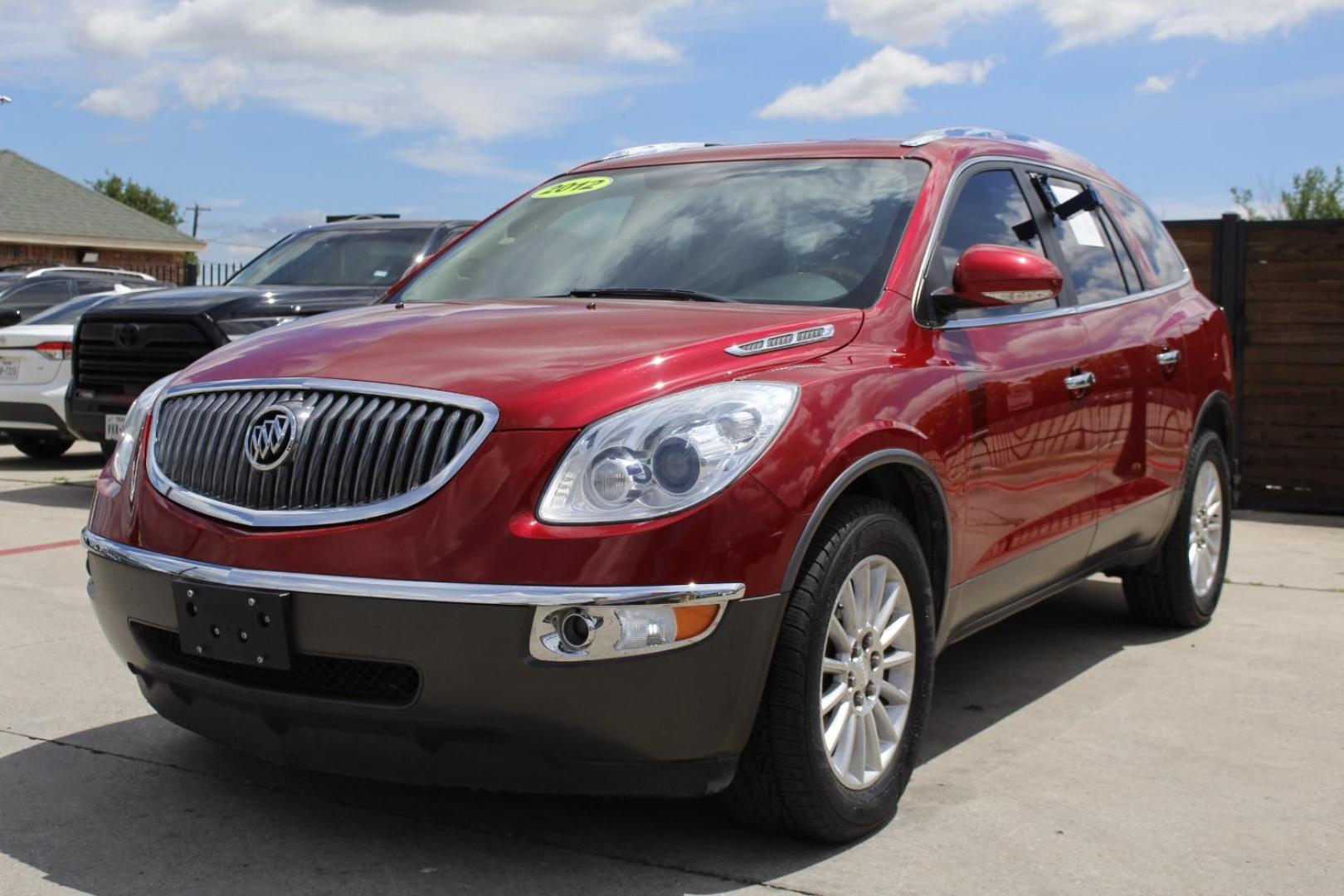 2012 Red Buick Enclave Leather (5GAKRCED7CJ) with an 3.6L V-6 gasoline direct injection engine, located at 2401 E Main St., Grand Prairie, TX, 75050, (972) 262-4440, 32.748981, -96.969643 - Photo#1