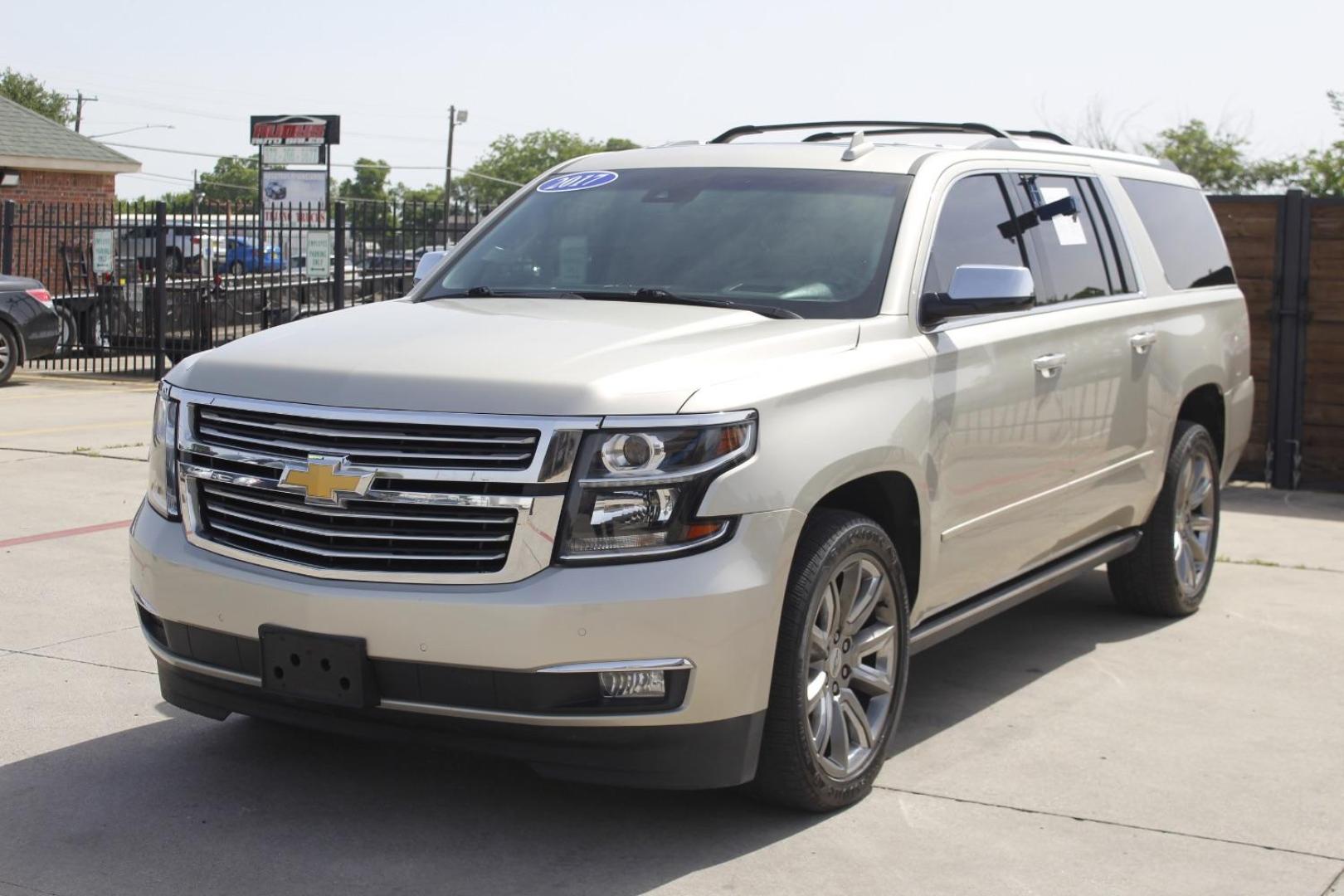 2017 Gold Chevrolet Suburban Premier (1GNSKJKC8HR) with an EcoTec3 5.3L V-8 gasoline direct injection engine, located at 2401 E Main St., Grand Prairie, TX, 75050, (972) 262-4440, 32.748981, -96.969643 - Photo#1