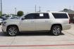 2017 Gold Chevrolet Suburban Premier (1GNSKJKC8HR) with an EcoTec3 5.3L V-8 gasoline direct injection engine, located at 2401 E Main St., Grand Prairie, TX, 75050, (972) 262-4440, 32.748981, -96.969643 - Photo#2