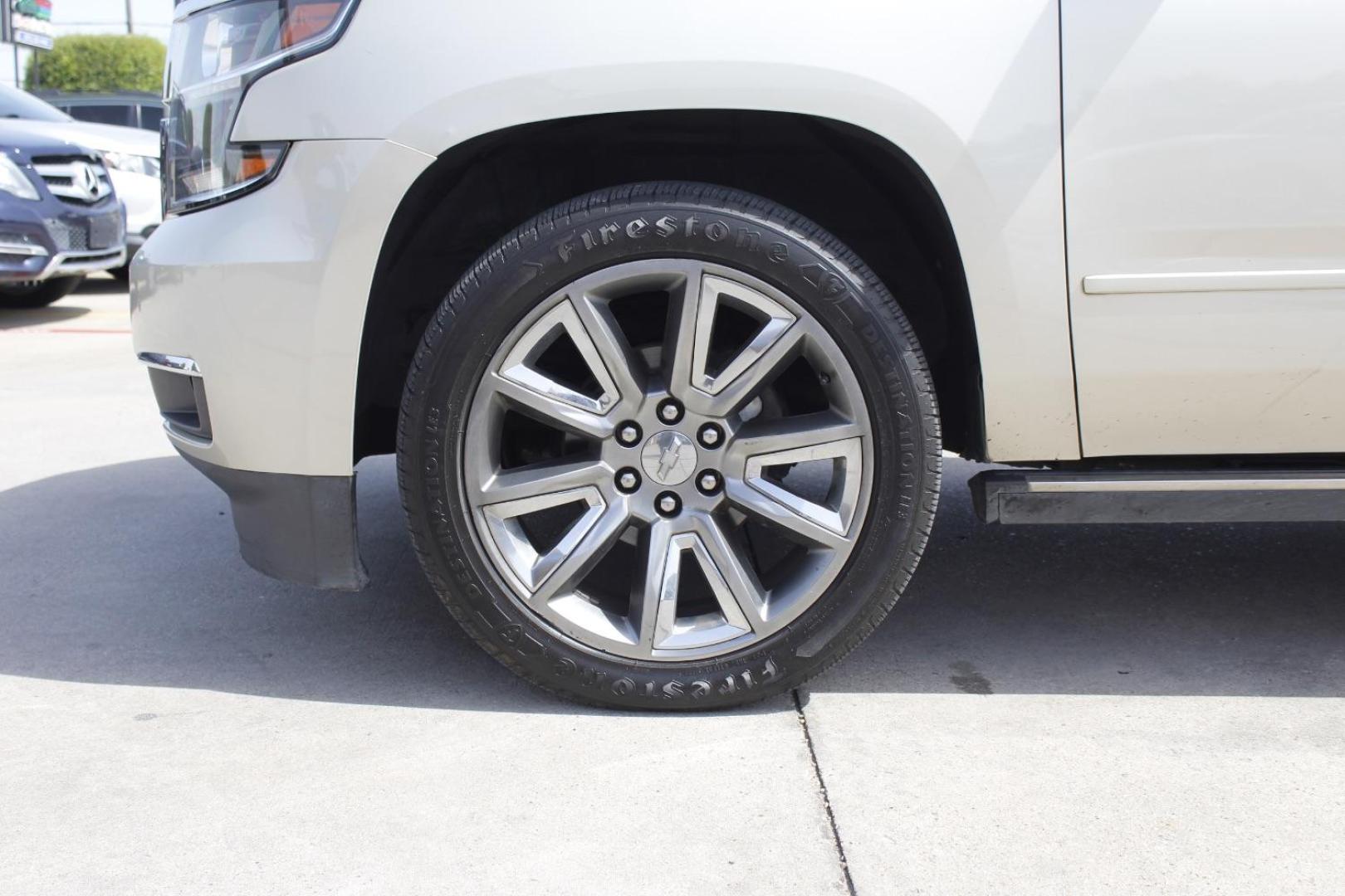 2017 Gold Chevrolet Suburban Premier (1GNSKJKC8HR) with an EcoTec3 5.3L V-8 gasoline direct injection engine, located at 2401 E Main St., Grand Prairie, TX, 75050, (972) 262-4440, 32.748981, -96.969643 - Photo#3