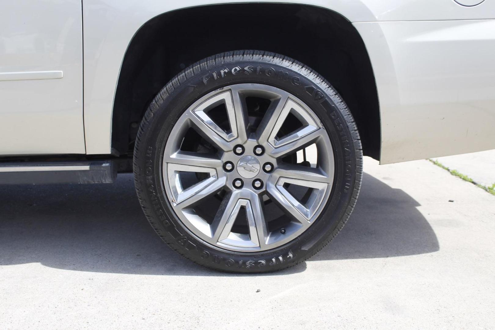 2017 Gold Chevrolet Suburban Premier (1GNSKJKC8HR) with an EcoTec3 5.3L V-8 gasoline direct injection engine, located at 2401 E Main St., Grand Prairie, TX, 75050, (972) 262-4440, 32.748981, -96.969643 - Photo#4