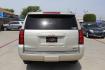 2017 Gold Chevrolet Suburban Premier (1GNSKJKC8HR) with an EcoTec3 5.3L V-8 gasoline direct injection engine, located at 2401 E Main St., Grand Prairie, TX, 75050, (972) 262-4440, 32.748981, -96.969643 - Photo#5