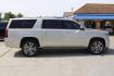 2017 Gold Chevrolet Suburban Premier (1GNSKJKC8HR) with an EcoTec3 5.3L V-8 gasoline direct injection engine, located at 2401 E Main St., Grand Prairie, TX, 75050, (972) 262-4440, 32.748981, -96.969643 - Photo#9