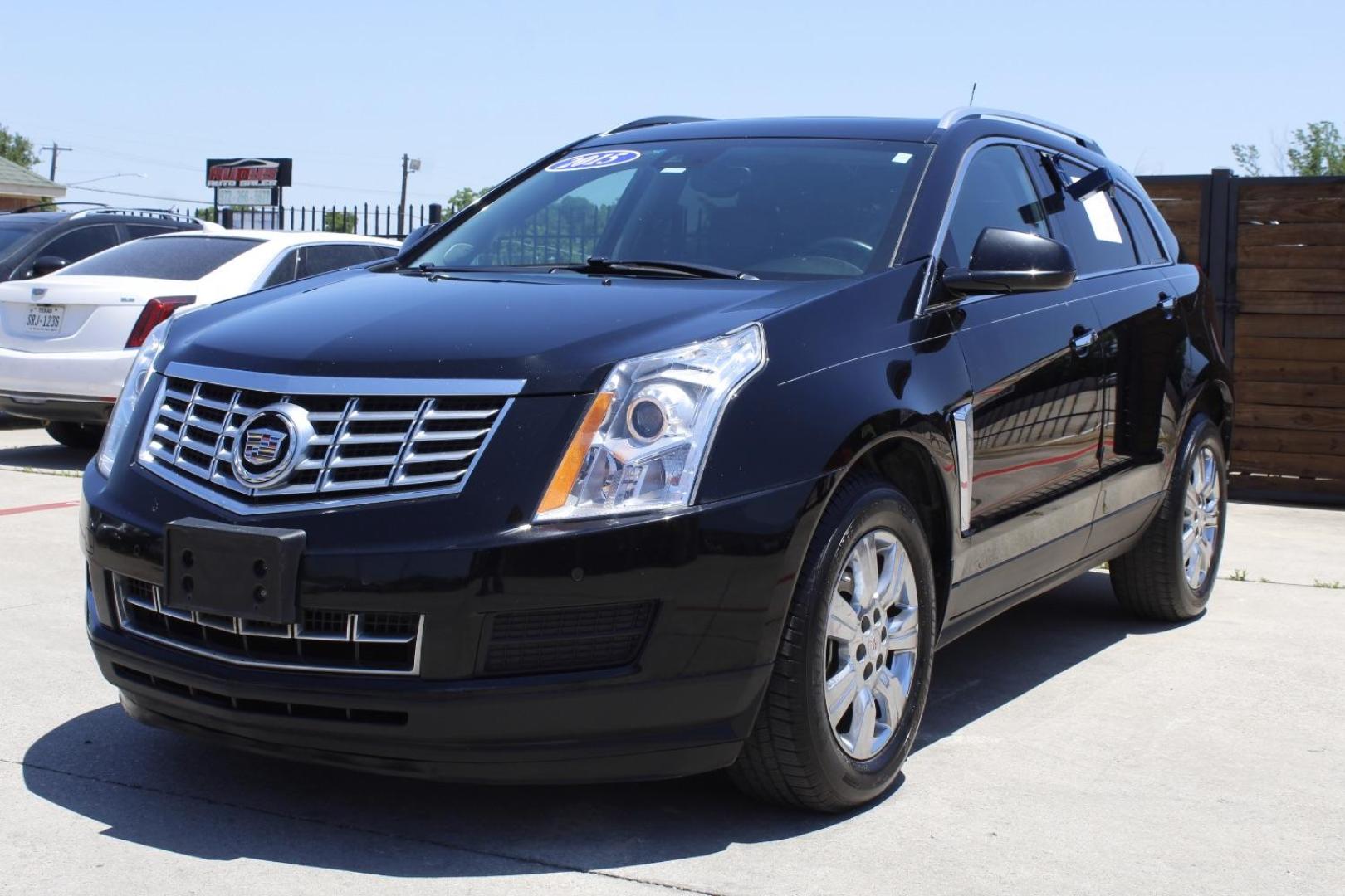 2015 Black Cadillac SRX Luxury Collection (3GYFNBE39FS) with an 3.6L V-6 gasoline direct injection engine, located at 2401 E Main St., Grand Prairie, TX, 75050, (972) 262-4440, 32.748981, -96.969643 - Photo#1
