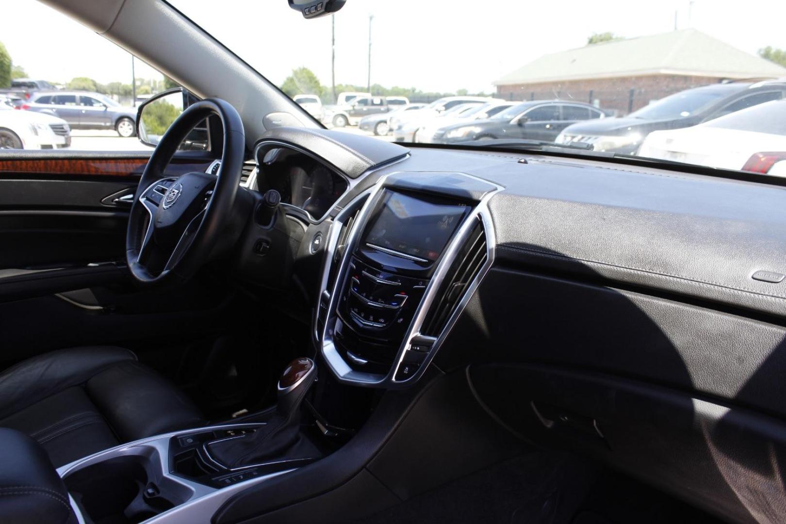 2015 Black Cadillac SRX Luxury Collection (3GYFNBE39FS) with an 3.6L V-6 gasoline direct injection engine, located at 2401 E Main St., Grand Prairie, TX, 75050, (972) 262-4440, 32.748981, -96.969643 - Photo#13