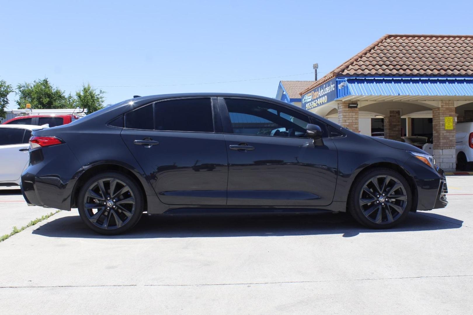 2023 Black Toyota Corolla SE (5YFS4MCE2PP) with an Dynamic Force 2L I-4 port/direct injection engine, located at 2401 E Main St., Grand Prairie, TX, 75050, (972) 262-4440, 32.748981, -96.969643 - Photo#9
