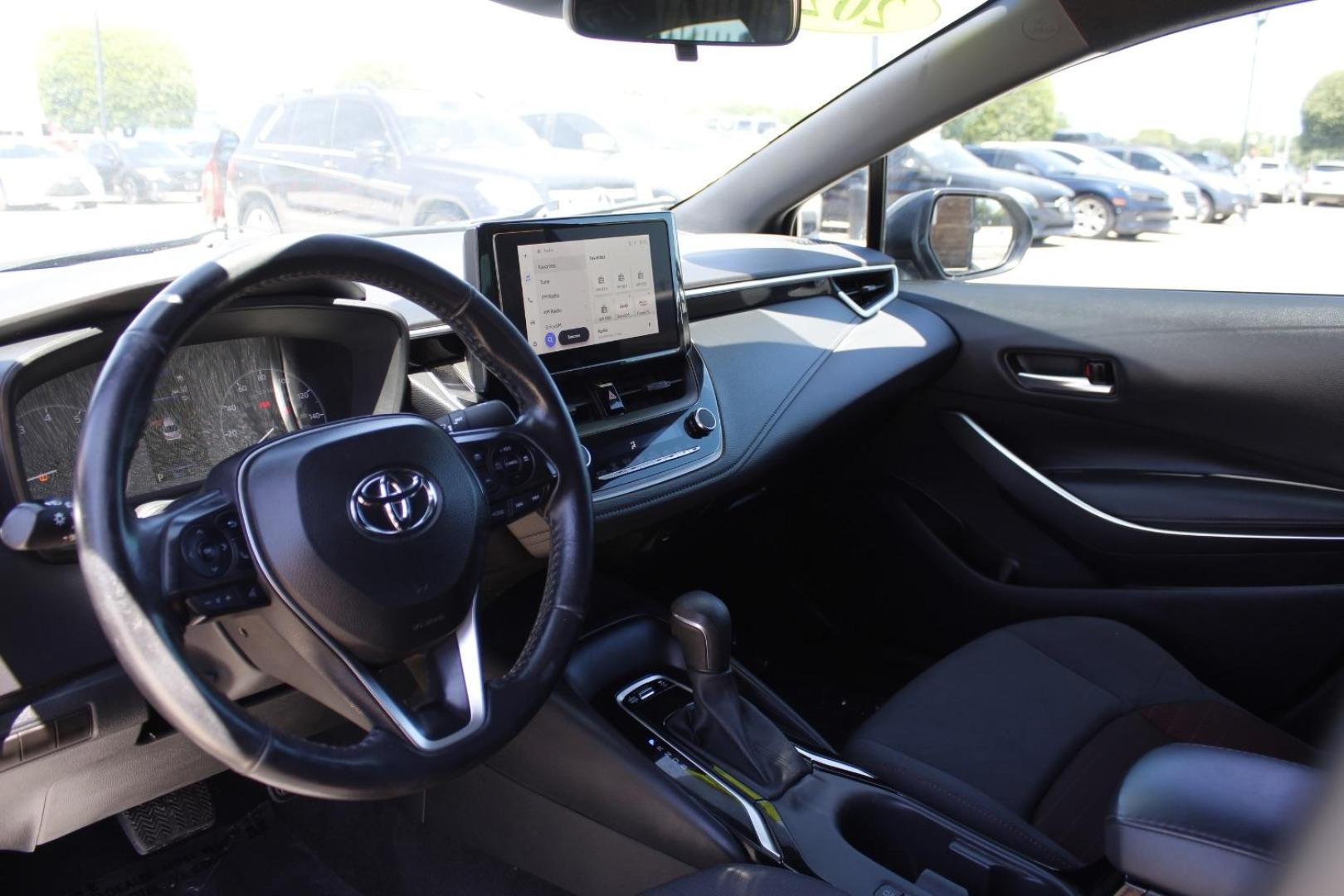 2023 Black Toyota Corolla SE (5YFS4MCE2PP) with an Dynamic Force 2L I-4 port/direct injection engine, located at 2401 E Main St., Grand Prairie, TX, 75050, (972) 262-4440, 32.748981, -96.969643 - Photo#12