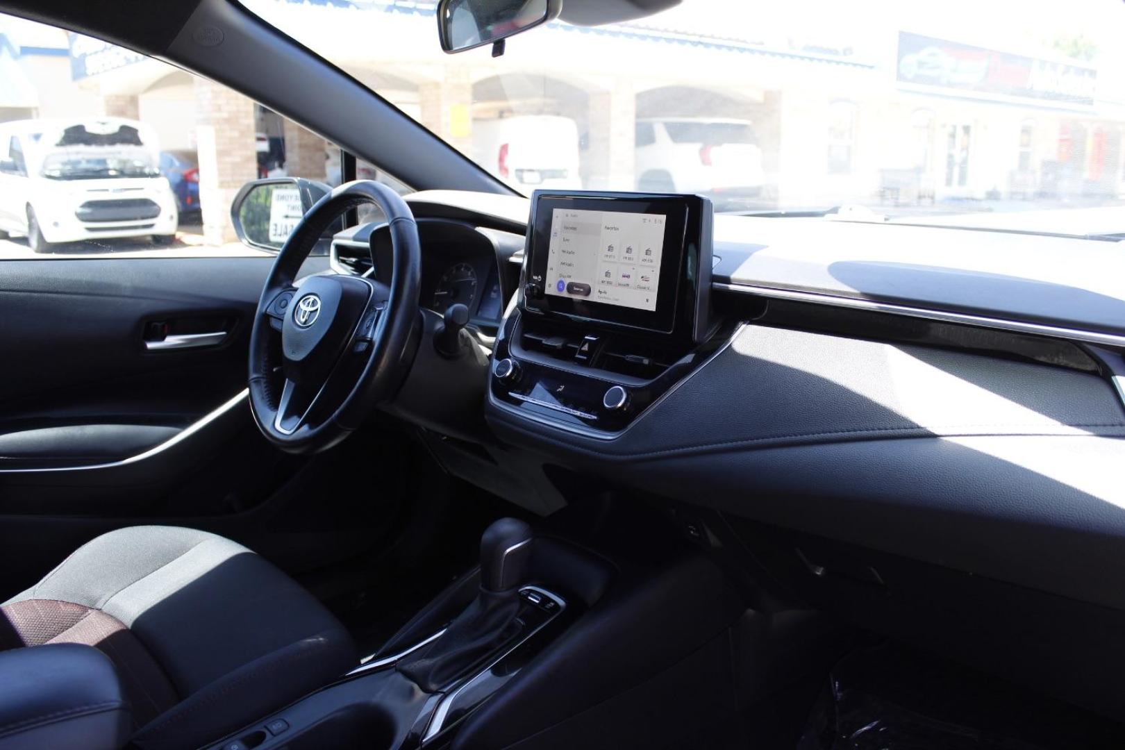 2023 Black Toyota Corolla SE (5YFS4MCE2PP) with an Dynamic Force 2L I-4 port/direct injection engine, located at 2401 E Main St., Grand Prairie, TX, 75050, (972) 262-4440, 32.748981, -96.969643 - Photo#14