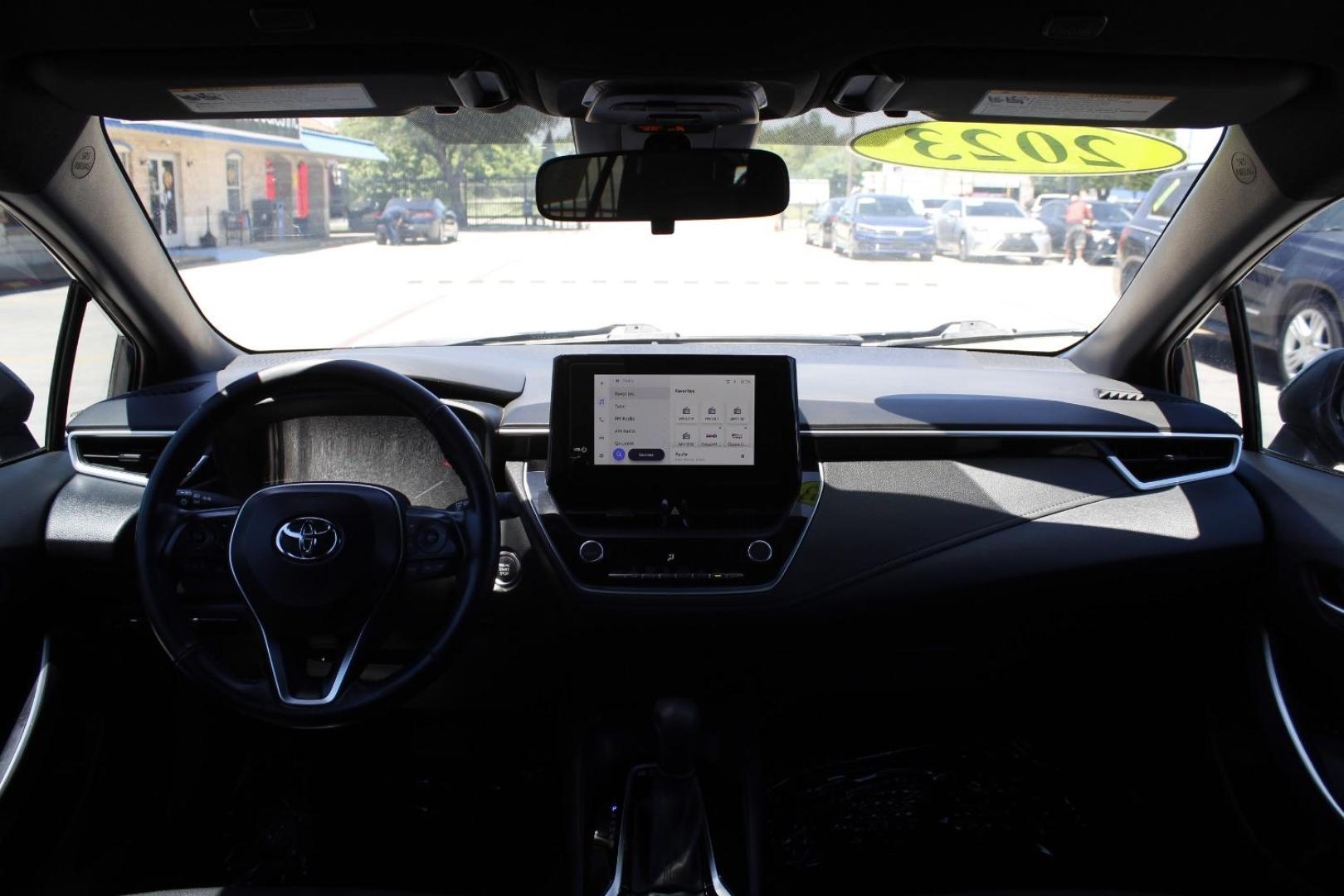 2023 Black Toyota Corolla SE (5YFS4MCE2PP) with an Dynamic Force 2L I-4 port/direct injection engine, located at 2401 E Main St., Grand Prairie, TX, 75050, (972) 262-4440, 32.748981, -96.969643 - Photo#15