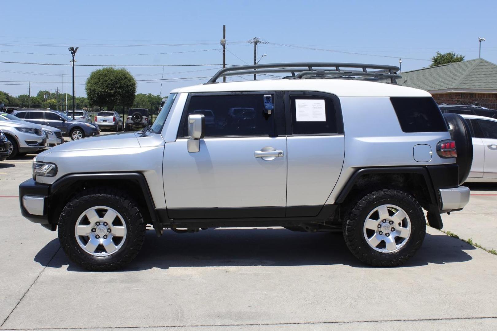 2007 Silver Toyota FJ Cruiser 4WD (JTEBU11F070) , located at 2401 E Main St., Grand Prairie, TX, 75050, (972) 262-4440, 32.748981, -96.969643 - Photo#2