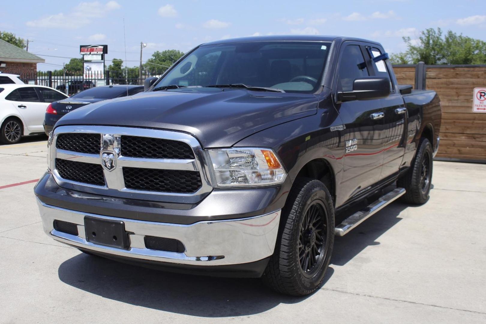 2017 Gray Ram 1500 SLT Quad Cab 4x4 6'4 Box (1C6RR7GG9HS) , located at 2401 E Main St., Grand Prairie, TX, 75050, (972) 262-4440, 32.748981, -96.969643 - Photo#1