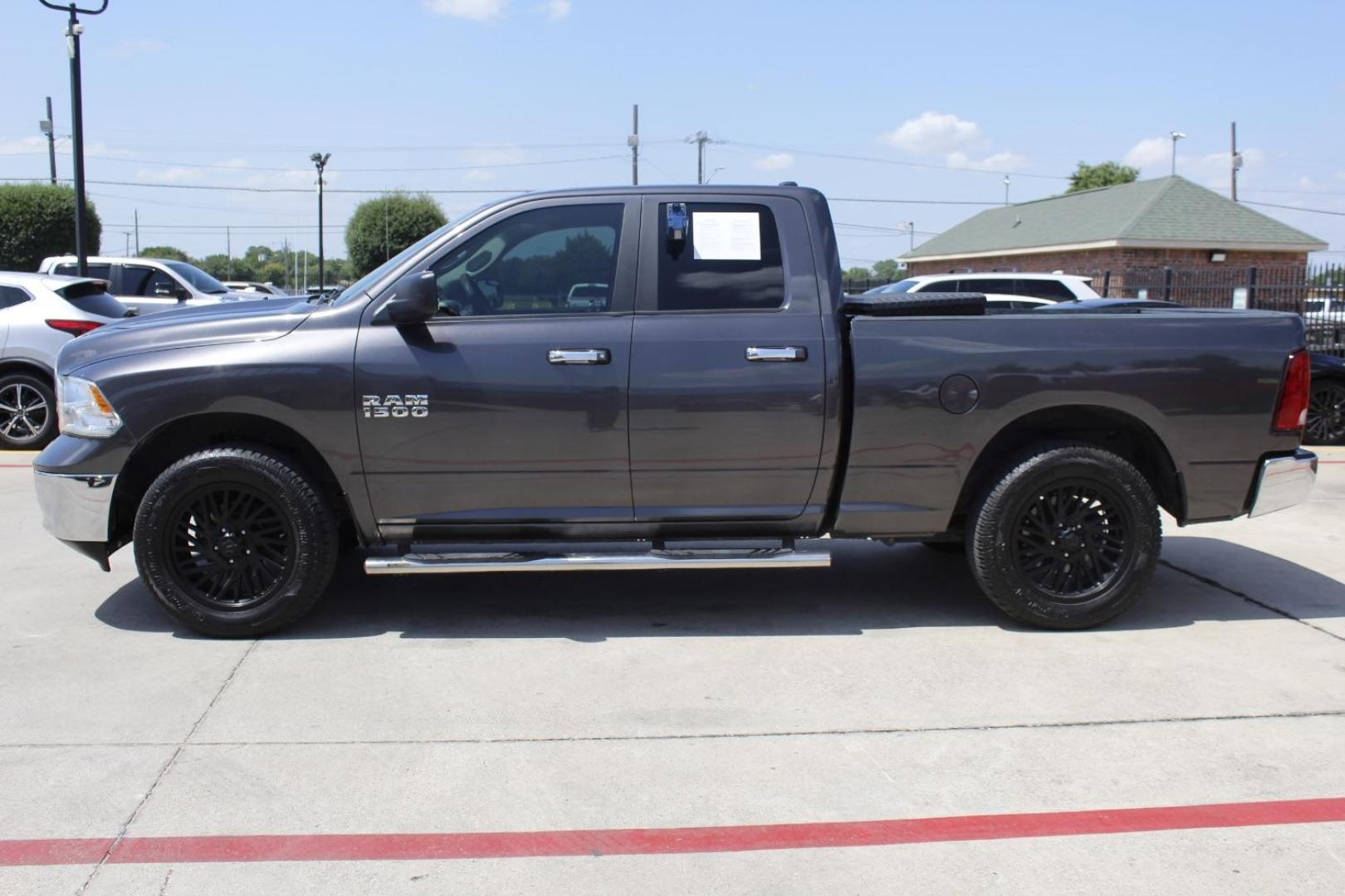 2017 Gray Ram 1500 SLT Quad Cab 4x4 6'4 Box (1C6RR7GG9HS) , located at 2401 E Main St., Grand Prairie, TX, 75050, (972) 262-4440, 32.748981, -96.969643 - Photo#2
