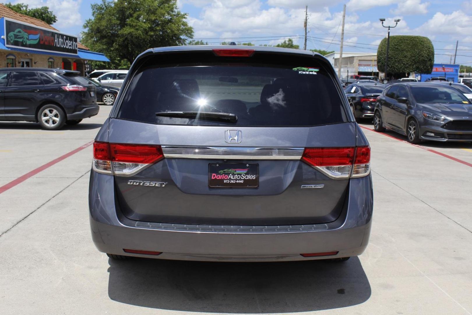 2016 Gray Honda Odyssey SE (5FNRL5H39GB) with an 3.5L V-6 i-VTEC variable valve control engine, located at 2401 E Main St., Grand Prairie, TX, 75050, (972) 262-4440, 32.748981, -96.969643 - Photo#6