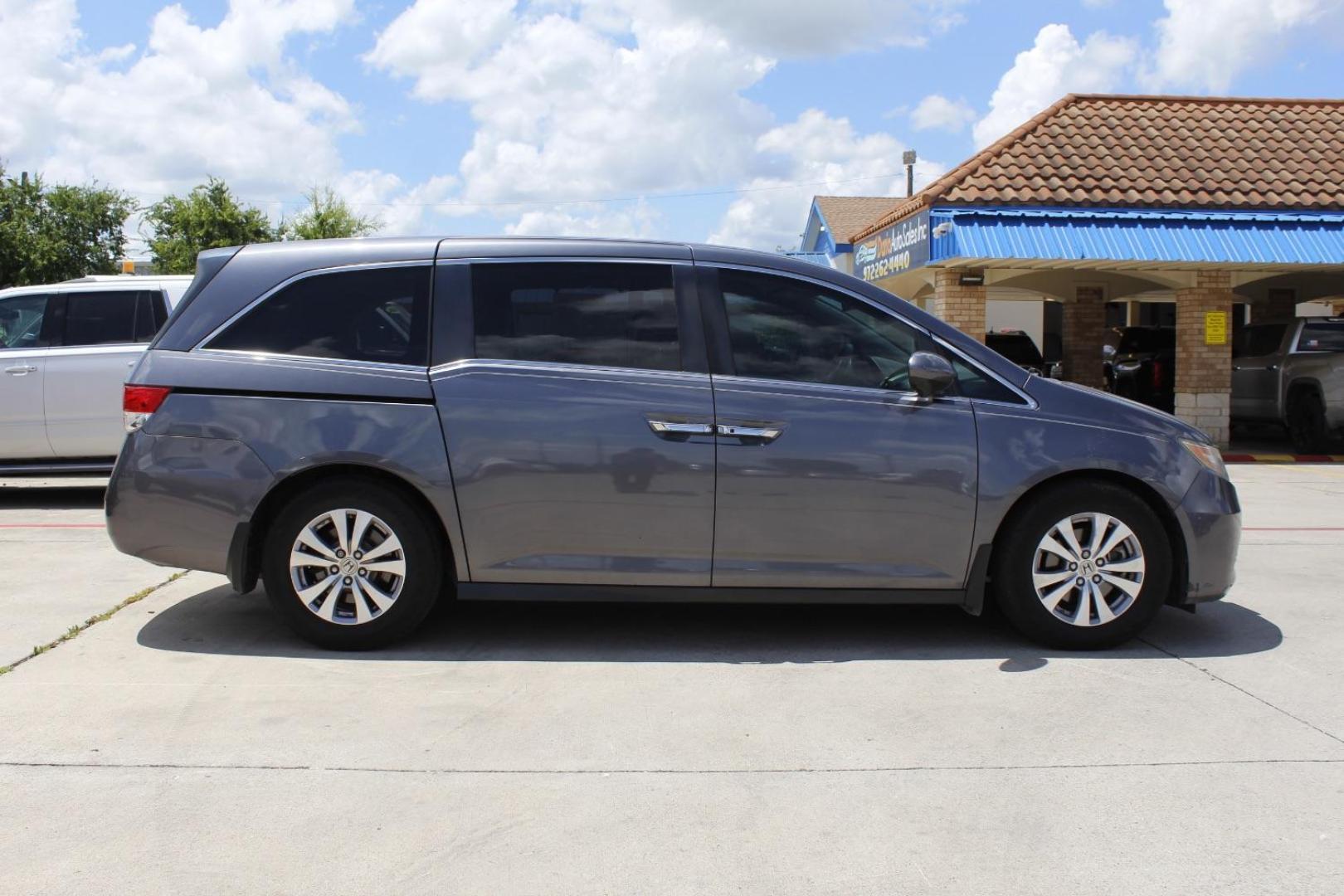 2016 Gray Honda Odyssey SE (5FNRL5H39GB) with an 3.5L V-6 i-VTEC variable valve control engine, located at 2401 E Main St., Grand Prairie, TX, 75050, (972) 262-4440, 32.748981, -96.969643 - Photo#9