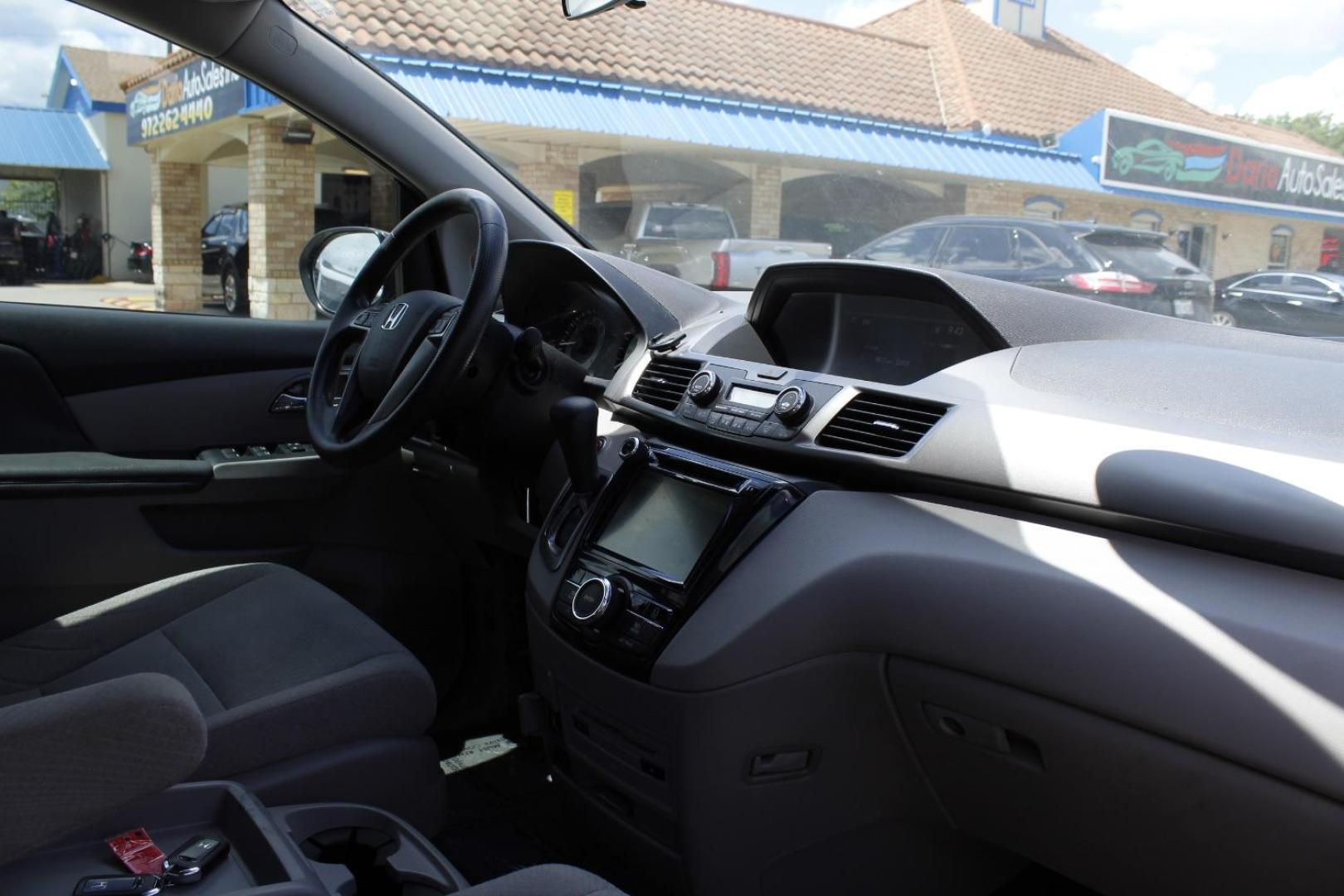 2016 Gray Honda Odyssey SE (5FNRL5H39GB) with an 3.5L V-6 i-VTEC variable valve control engine, located at 2401 E Main St., Grand Prairie, TX, 75050, (972) 262-4440, 32.748981, -96.969643 - Photo#14