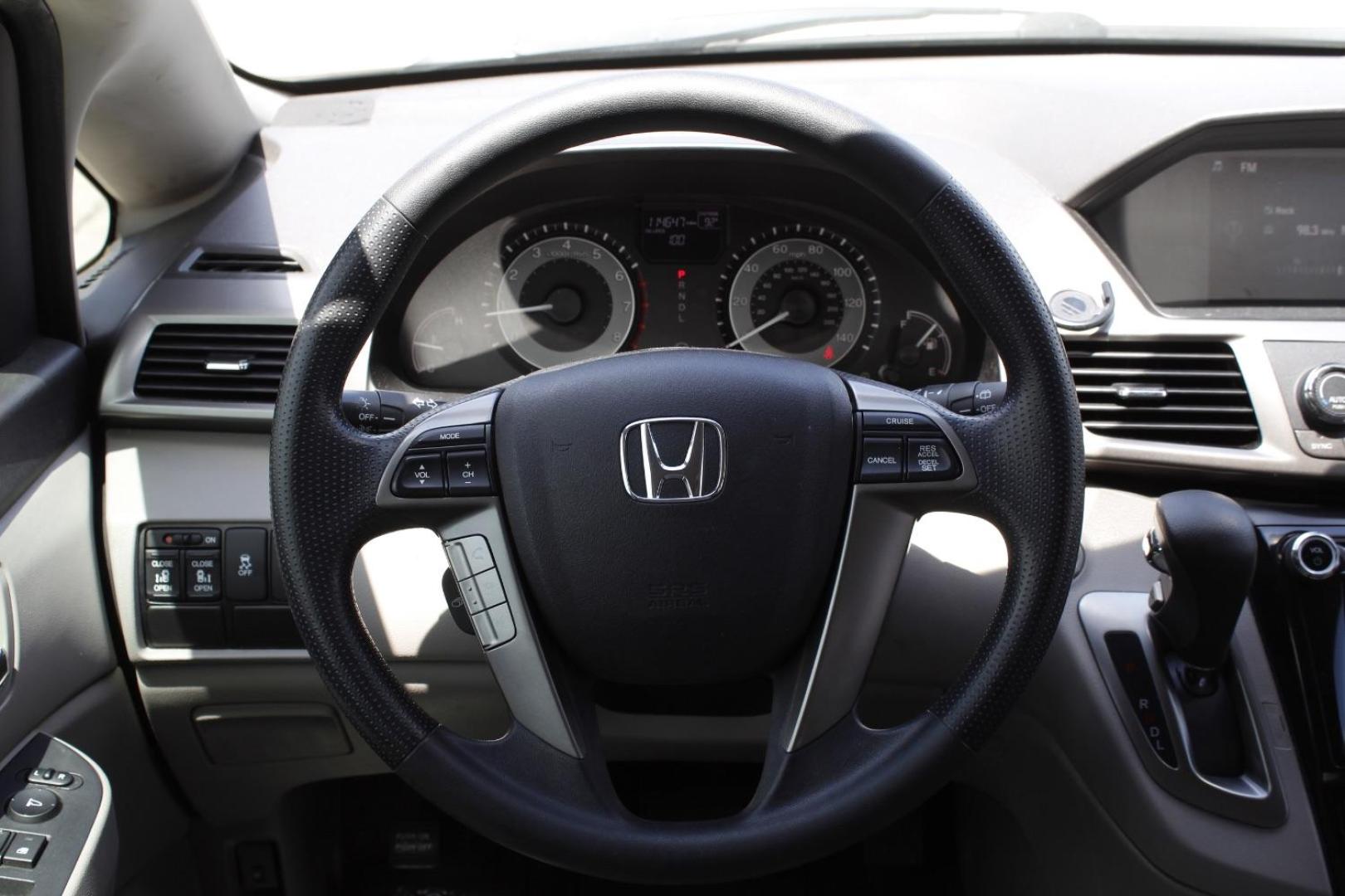 2016 Gray Honda Odyssey SE (5FNRL5H39GB) with an 3.5L V-6 i-VTEC variable valve control engine, located at 2401 E Main St., Grand Prairie, TX, 75050, (972) 262-4440, 32.748981, -96.969643 - Photo#21