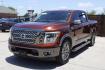 2017 Orange Nissan TITAN Platinum Reserve (1N6AA1E61HN) with an Endurance 5.6L V-8 gasoline direct injection engine, located at 2401 E Main St., Grand Prairie, TX, 75050, (972) 262-4440, 32.748981, -96.969643 - Photo#1
