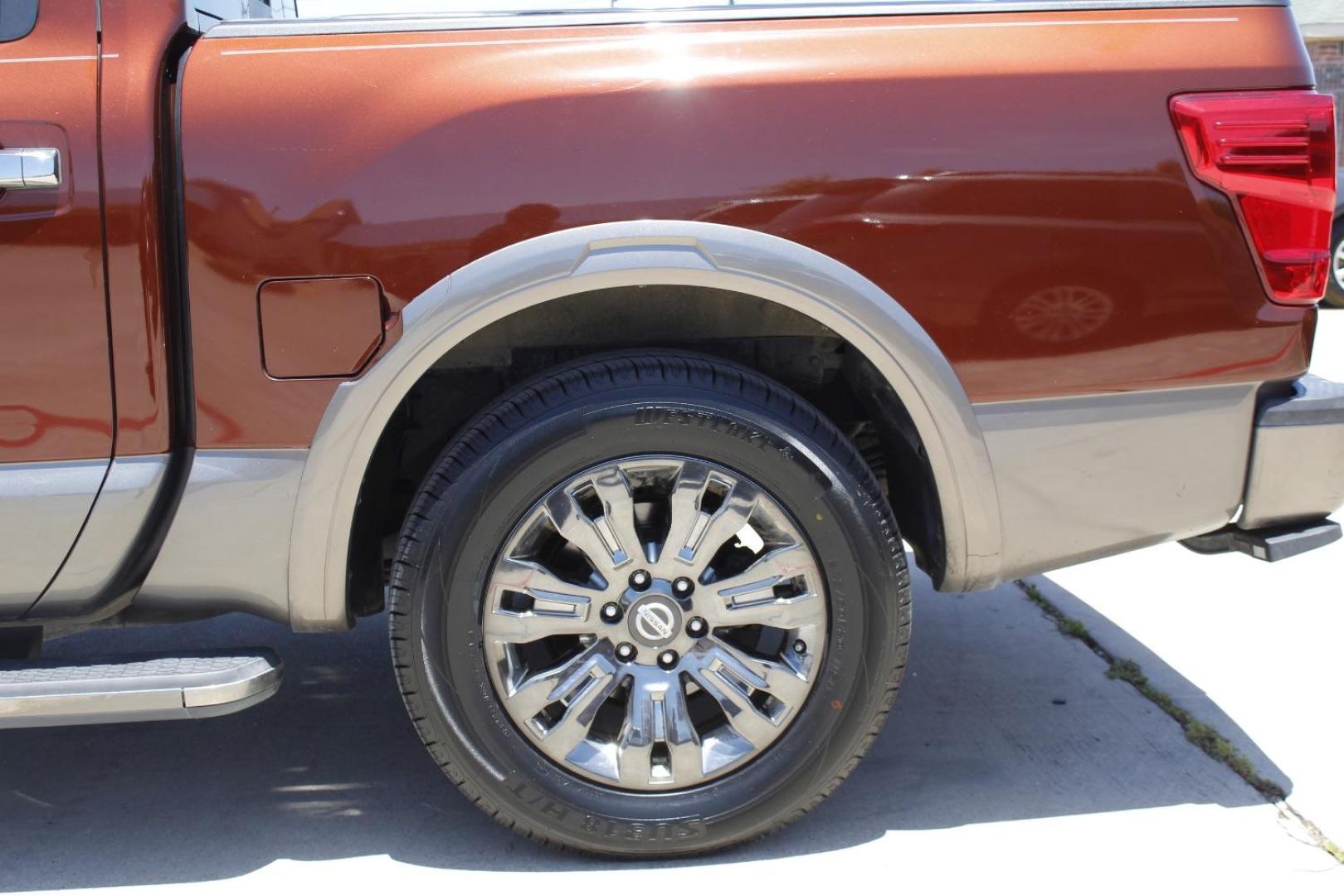 2017 Orange Nissan TITAN Platinum Reserve (1N6AA1E61HN) with an Endurance 5.6L V-8 gasoline direct injection engine, located at 2401 E Main St., Grand Prairie, TX, 75050, (972) 262-4440, 32.748981, -96.969643 - Photo#4