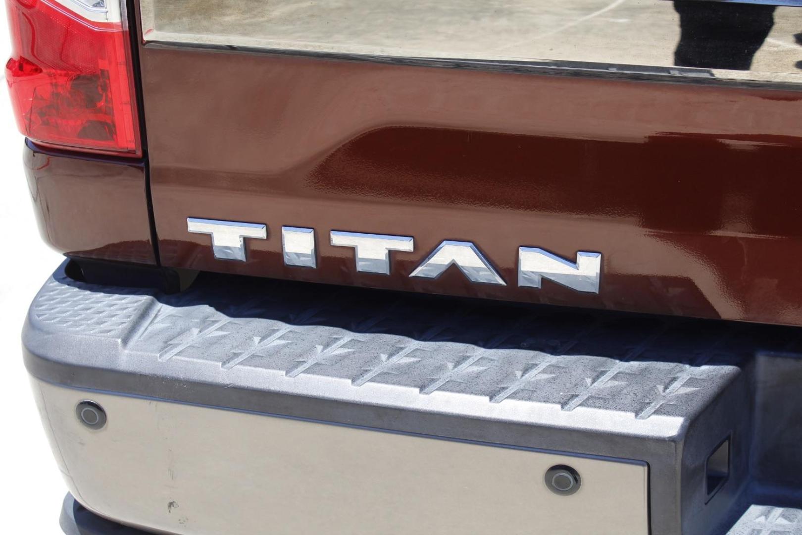 2017 Orange Nissan TITAN Platinum Reserve (1N6AA1E61HN) with an Endurance 5.6L V-8 gasoline direct injection engine, located at 2401 E Main St., Grand Prairie, TX, 75050, (972) 262-4440, 32.748981, -96.969643 - Photo#5